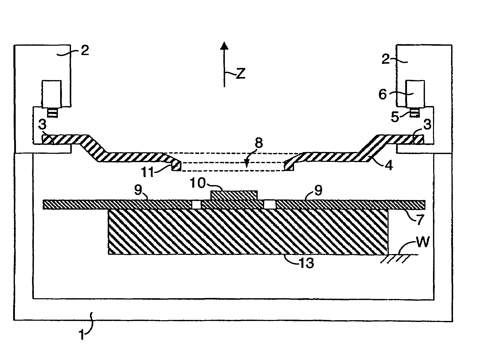 Wire bonder with a downholder for pressing the fingers of a system carrier onto a heating plate