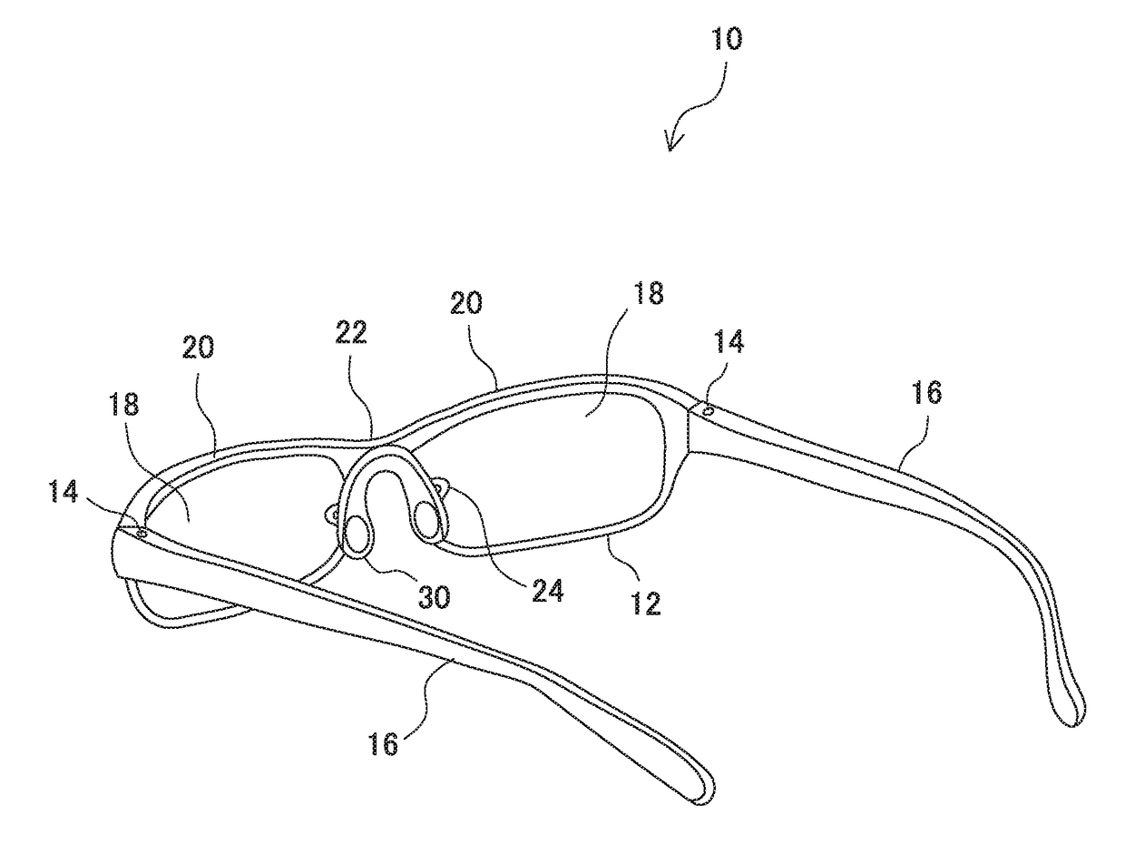 Nose pad and eyeglasses provided with the pad