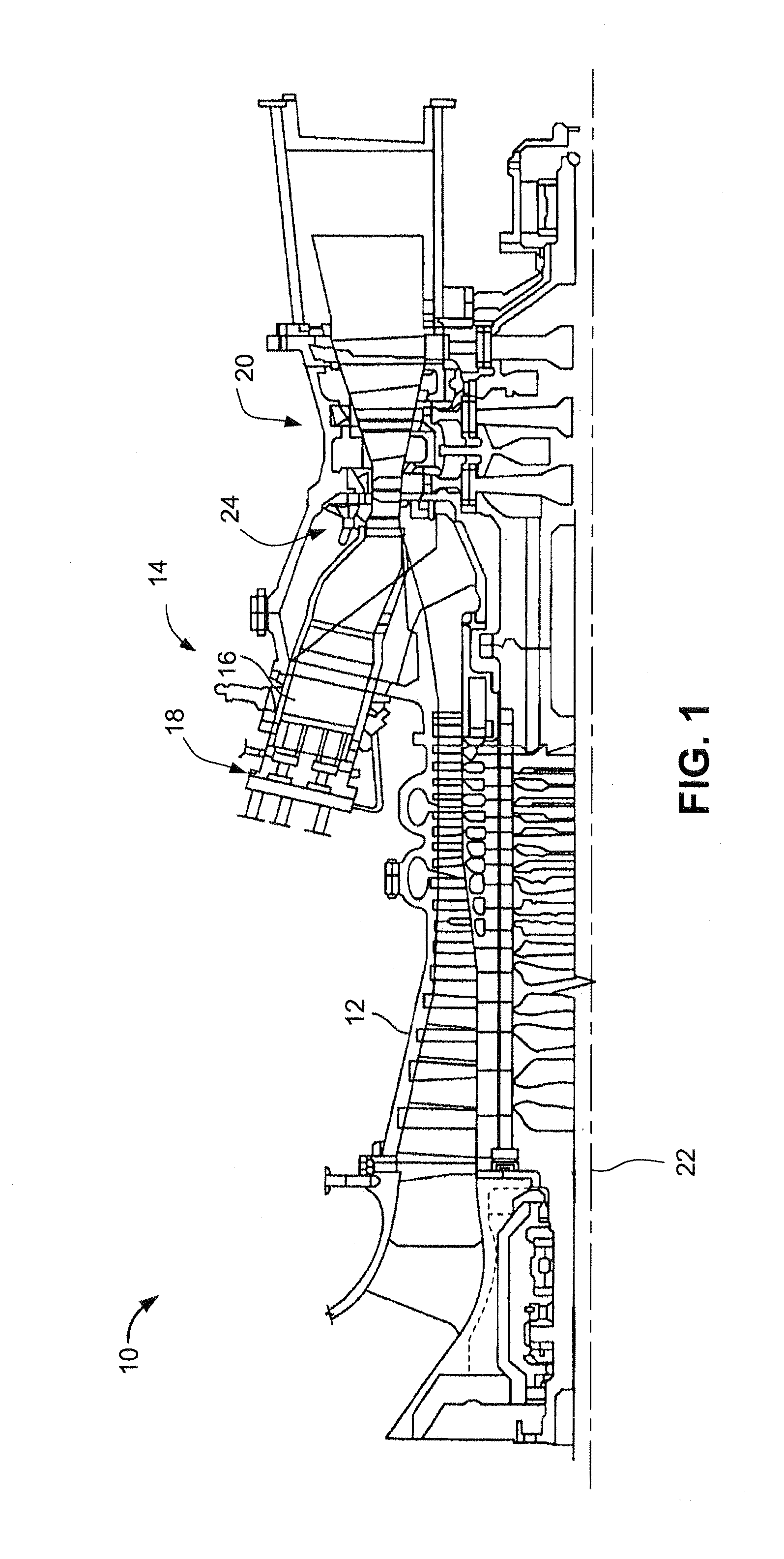 Gas turbine combustor endcover assembly with integrated flow restrictor and manifold seal