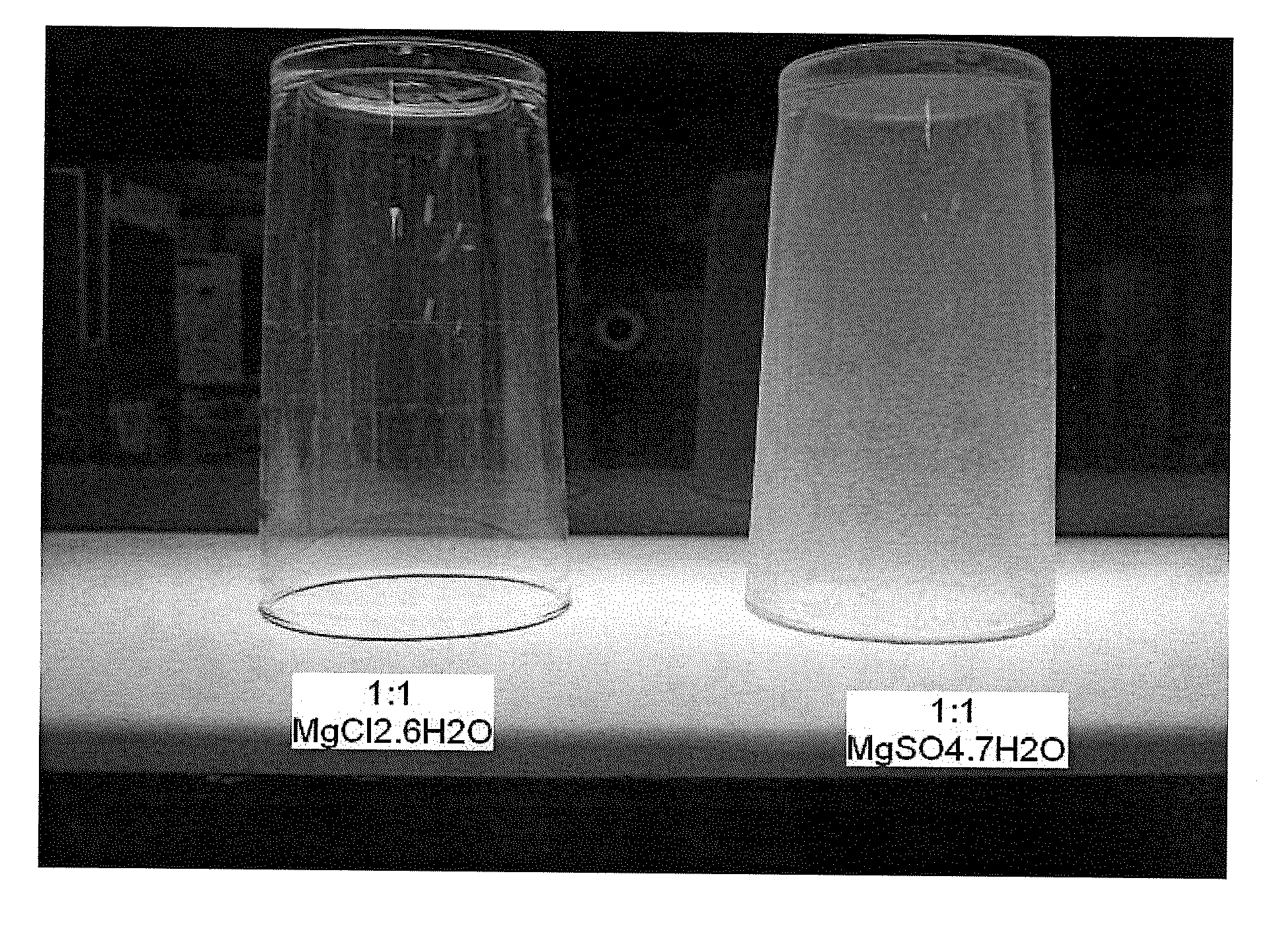 Cleaning compositions containing water soluble magnesium compounds and methods of using them