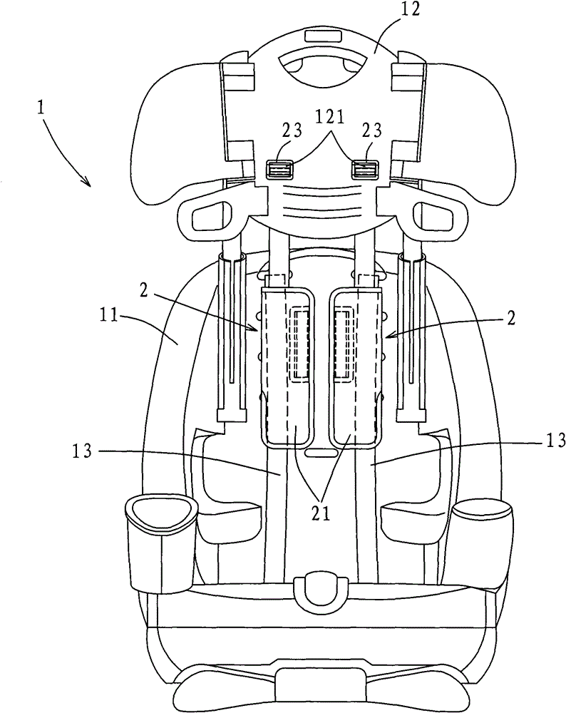 A child's car seat and a combination of headrest and shoulder harness pads for the child's car seat