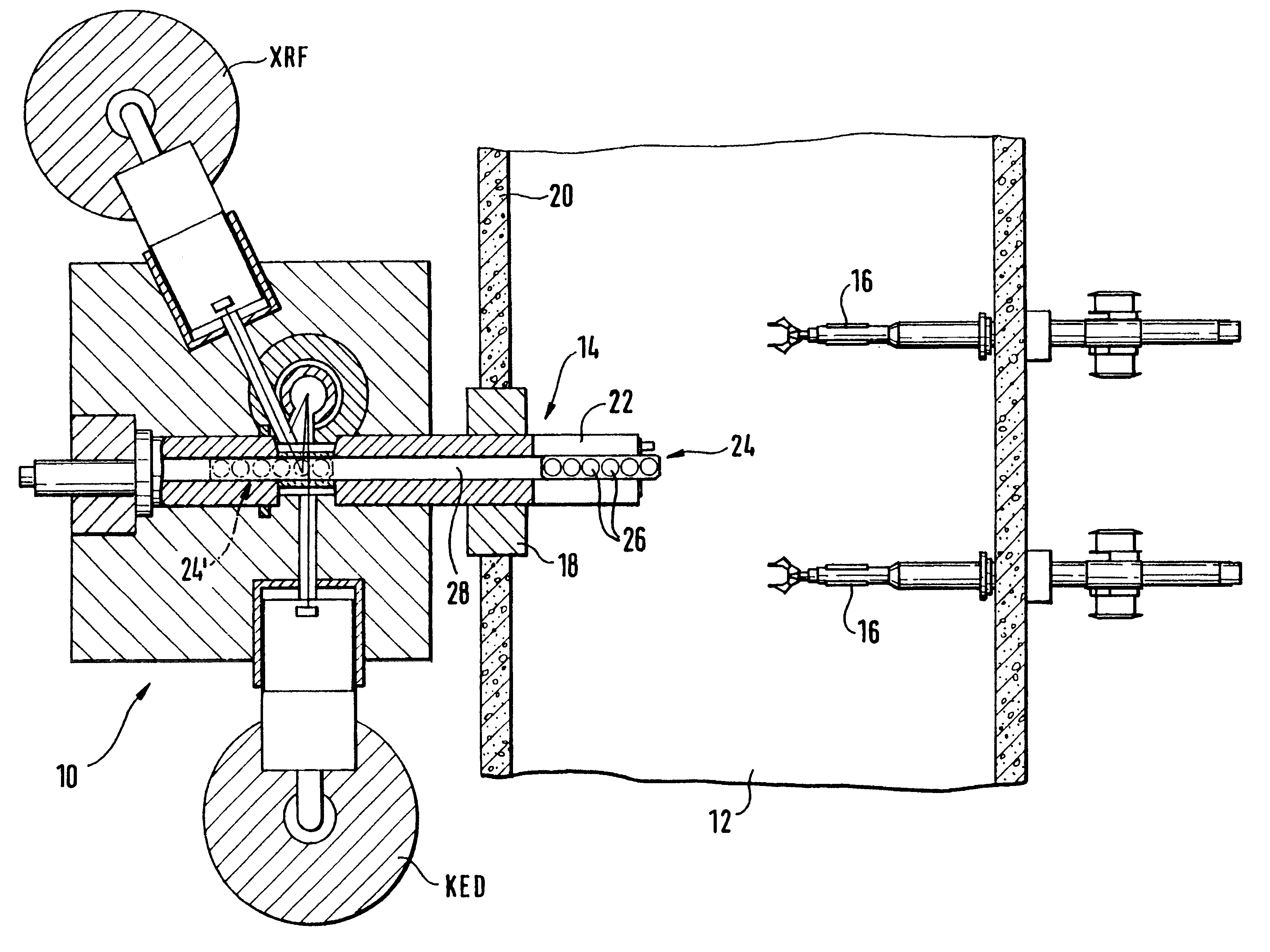 Sample changer for transferring radioactive samples between a hot cell and a measuring apparatus