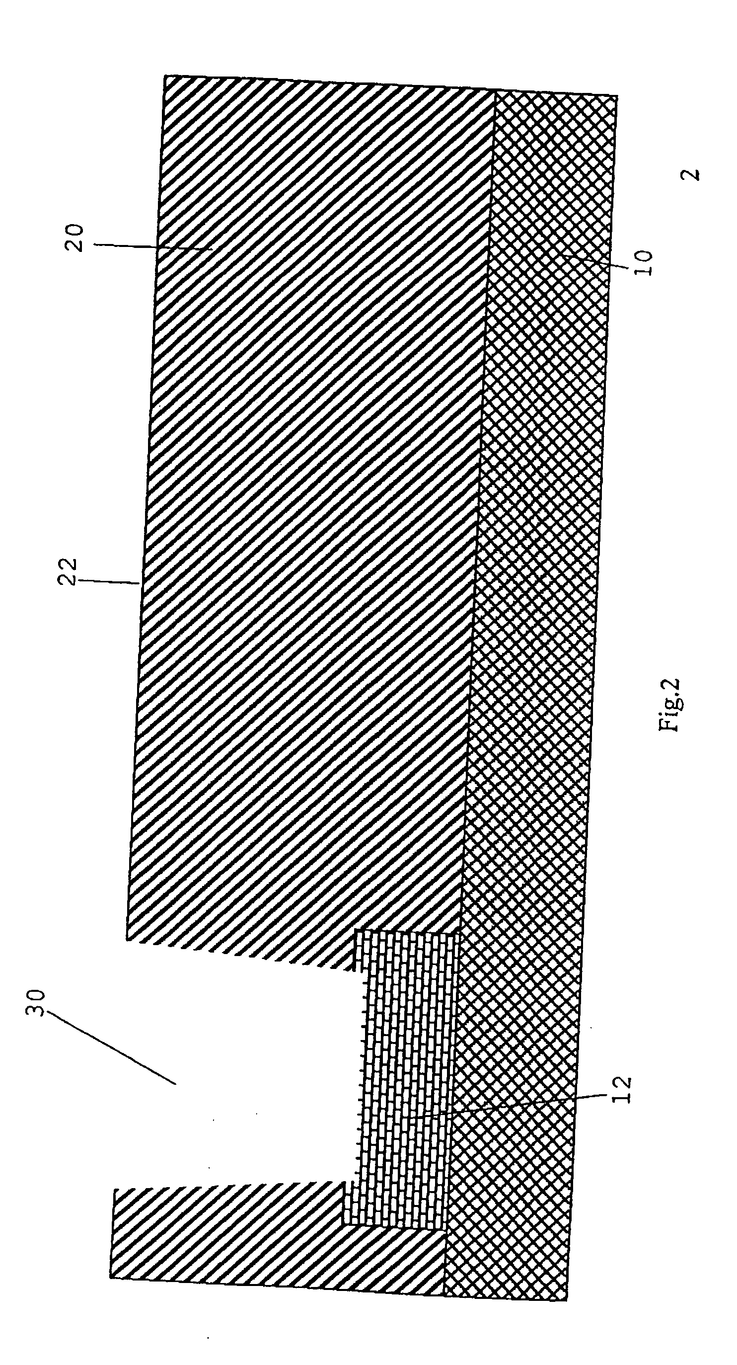 Method of producing a capacitor in a dielectric layer