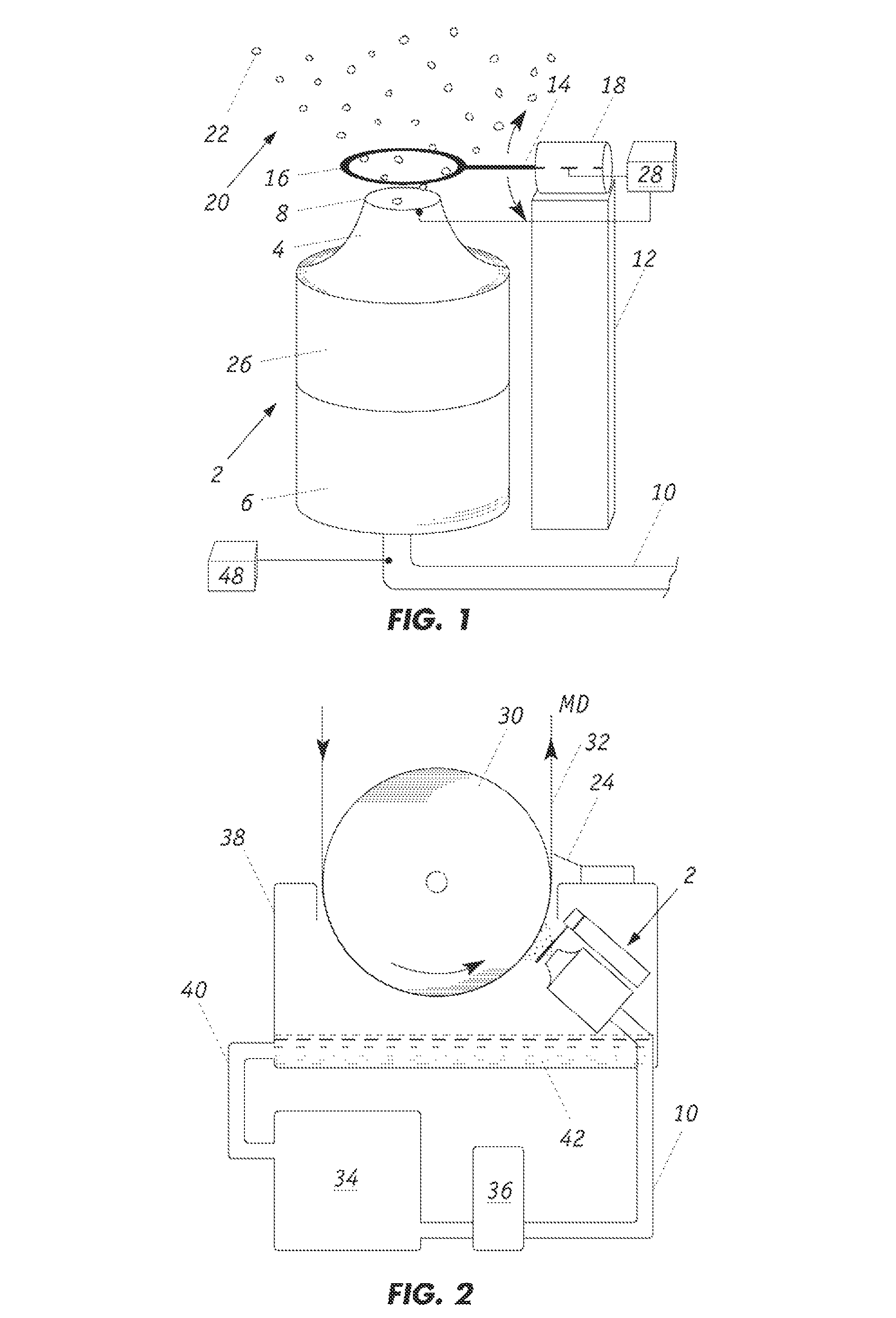 Apparatus for producing a spray of changed droplets of aqueous liquid