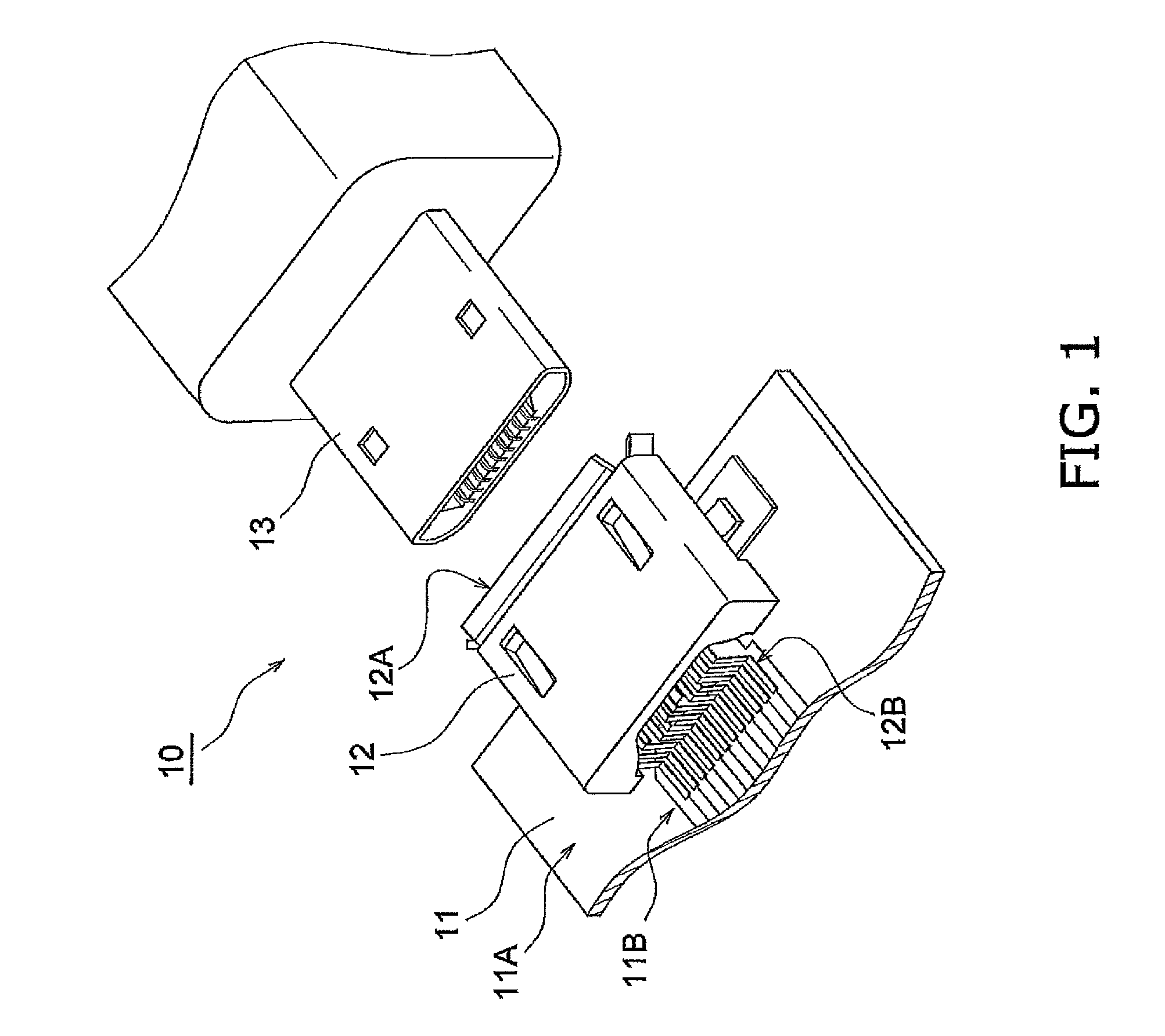 Connector assembly having signal and ground terminals