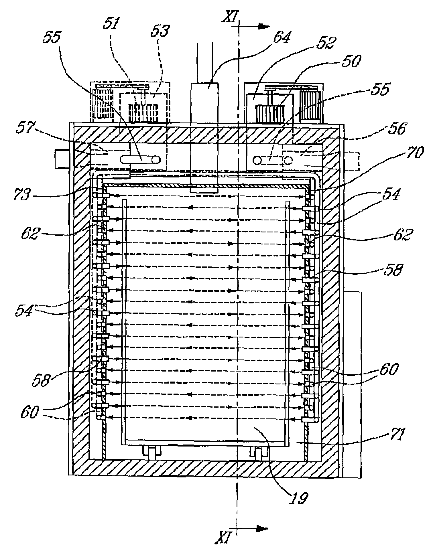 Apparatus and method for the heat treatment of lignocellulosic material