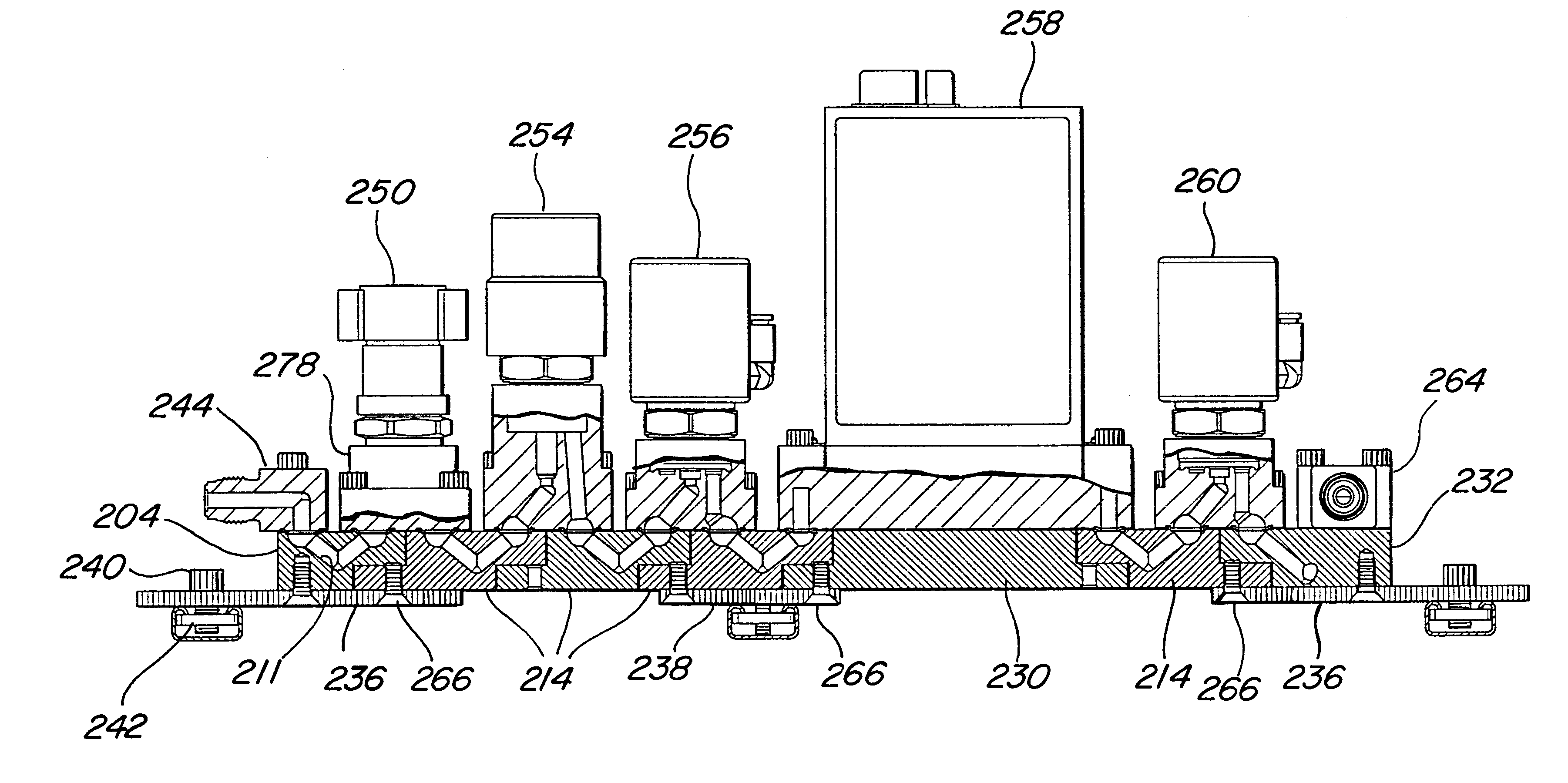Manifold system of removable components for distribution of fluids