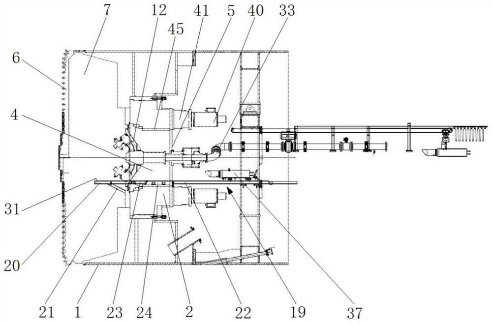 Heading machine and material transfer method of heading machine