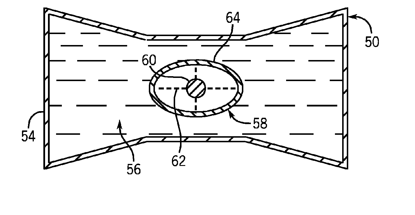 X-ray filter having dynamically displaceable x-ray attenuating fluid