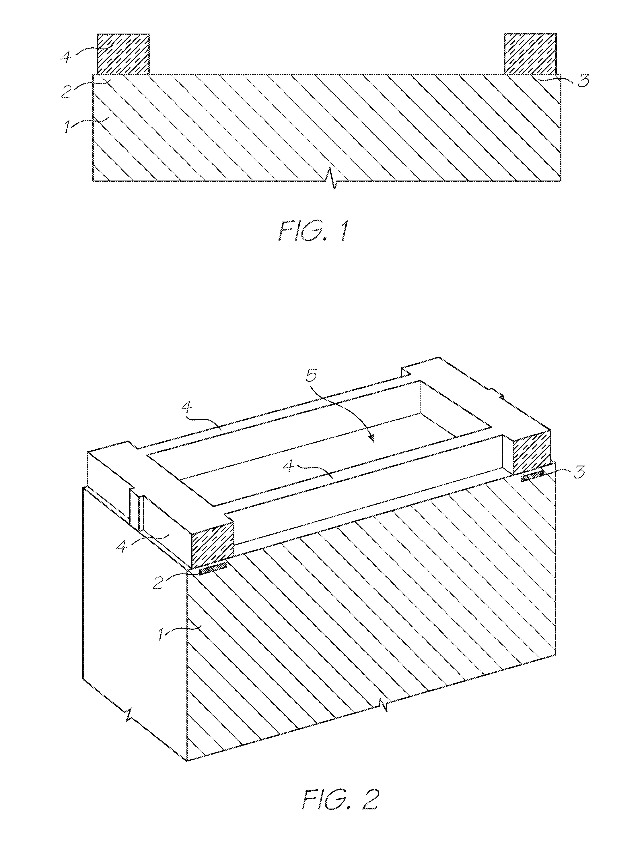 Printhead integrated circuit having common conductive track fused to nozzle plate