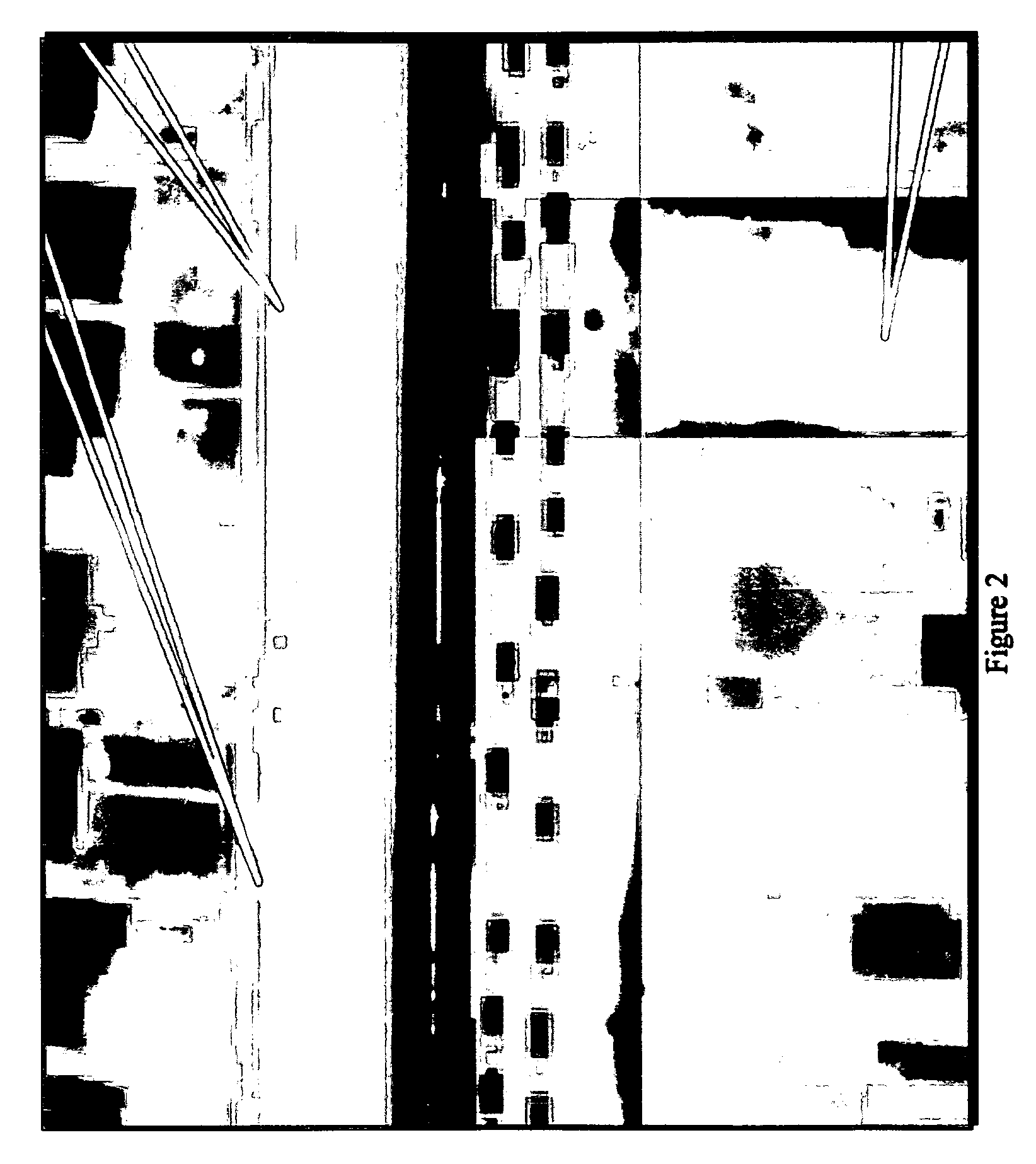 Remote sensing of subsurface artifacts by use of visual and thermal imagery