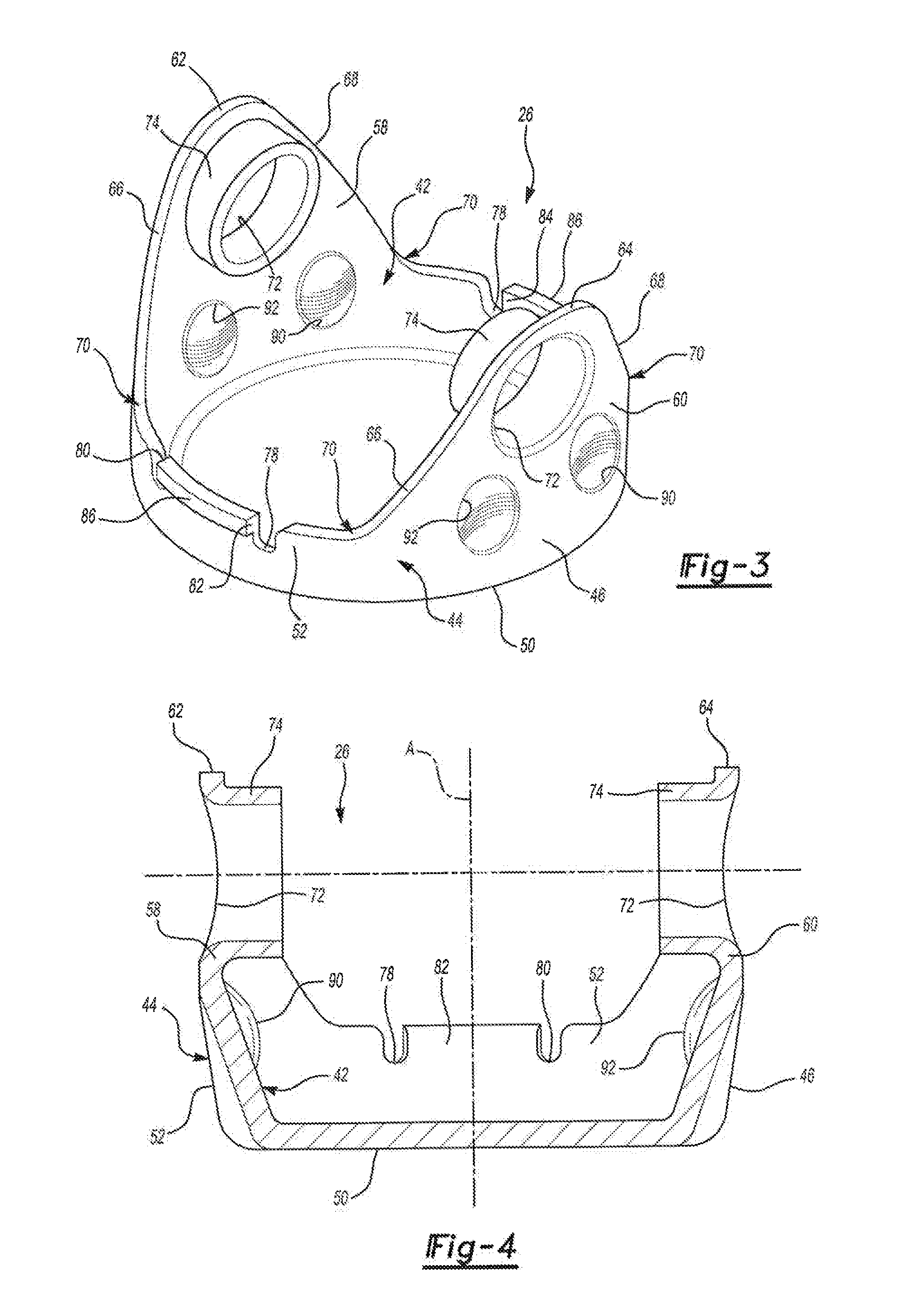 Universal joint assembly for an automotive driveline system