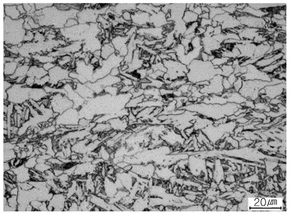 Thick steel plate having excellent low-temperature strain-aging impact properties and manufacturing method thereof