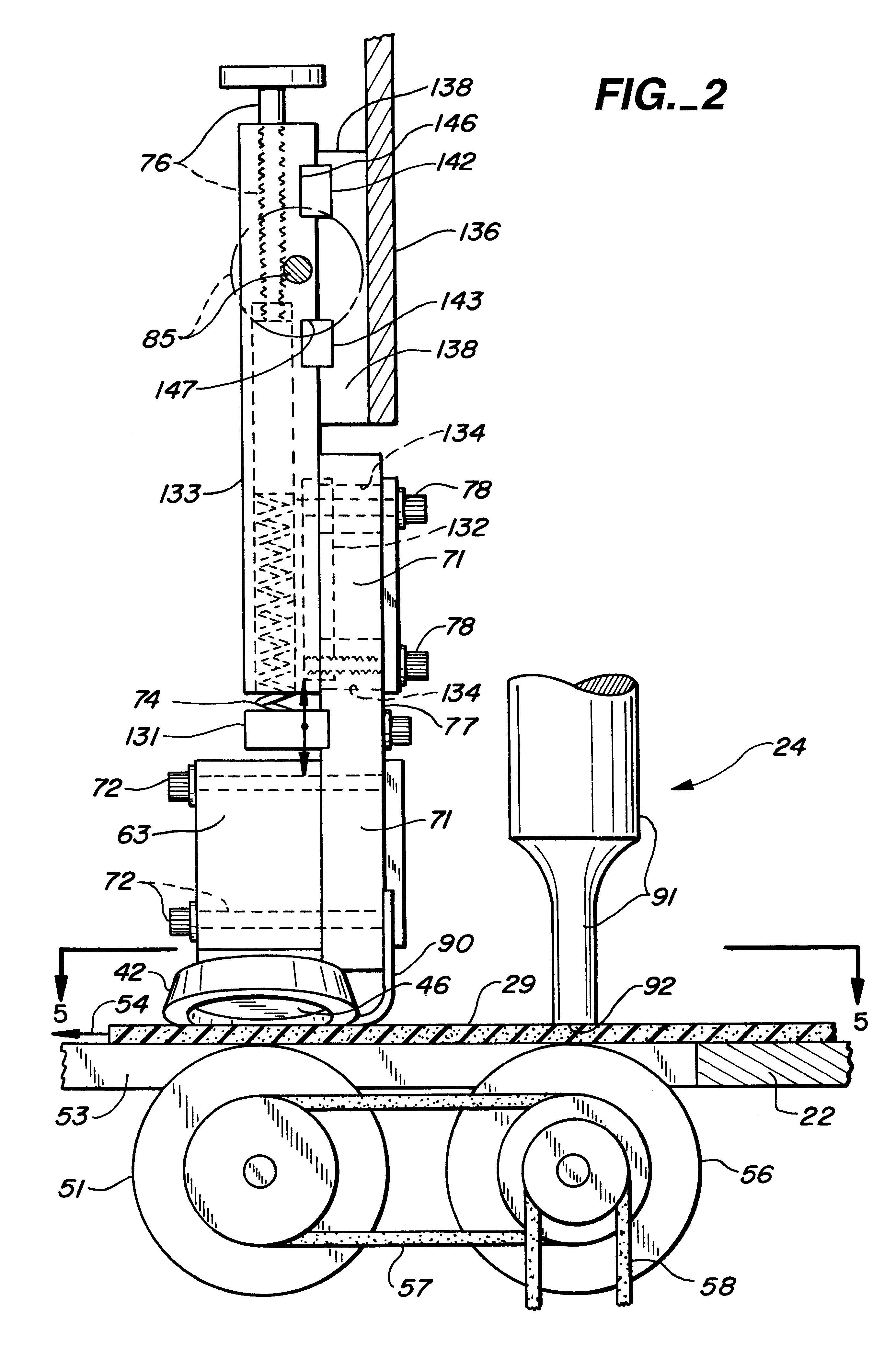 Apparatus and method for forming an adhesively bonded seam between resiliently compressible fabric sheets