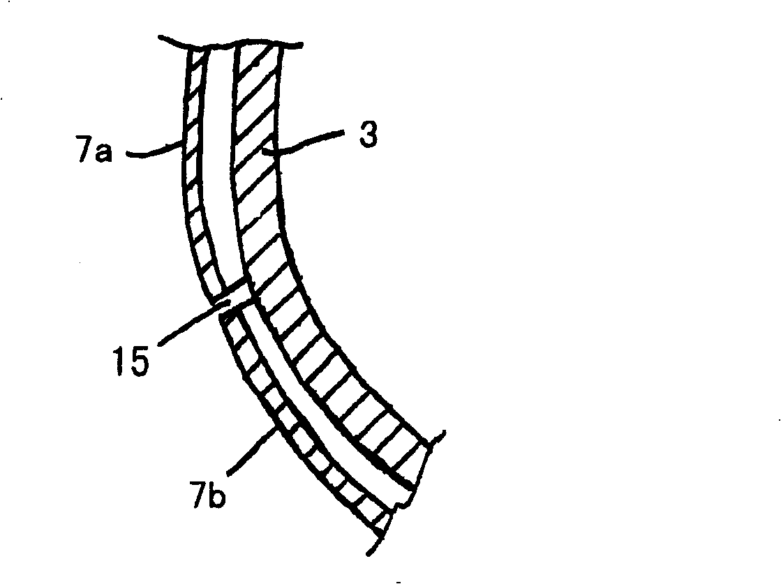 Vacuum cleaner comprising an elastic bumper strip