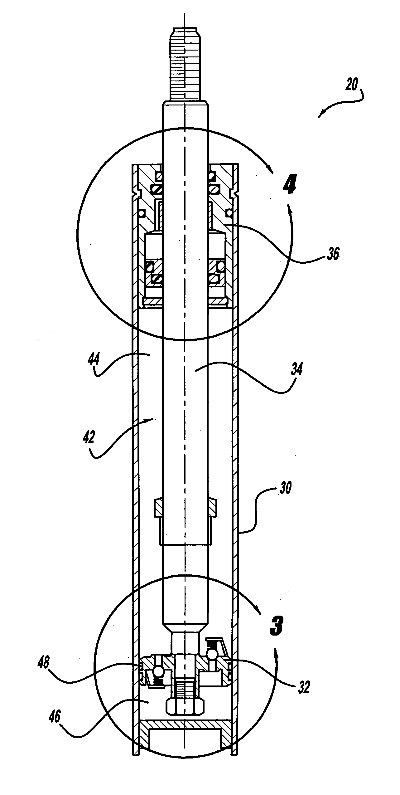 Rod guide and seal system for gas filled shock absorbers