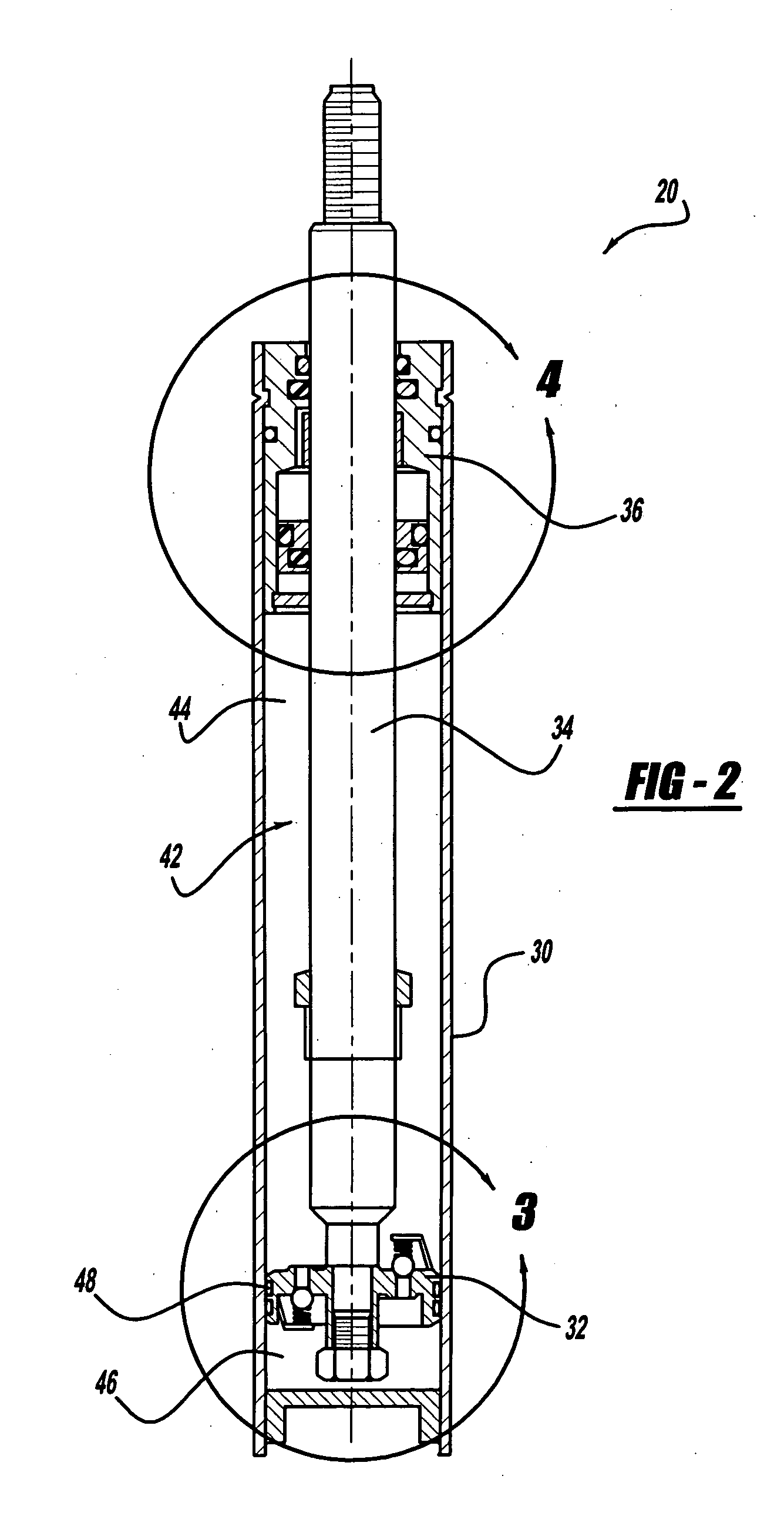 Rod guide and seal system for gas filled shock absorbers