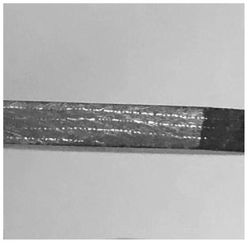 Tungsten mesh toughened hafnium carbonitride-based metal ceramic and preparation method thereof