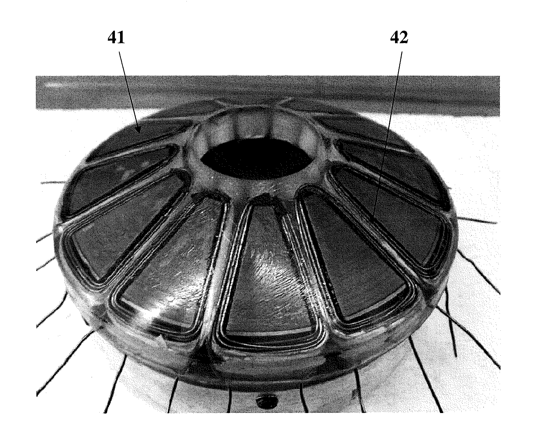 Method of constructing core with tapered pole pieces and low-loss electrical rotating machine with said core