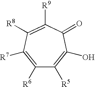 Synergistic mixtures of aromatic alcohols and derivatives thereof and tropolone (derivatives)