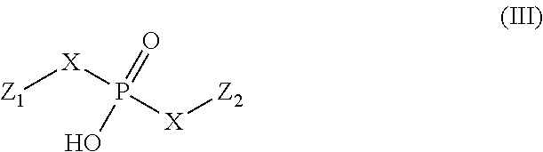 Compositions and methods for resisting discoloration of wood and treated wood