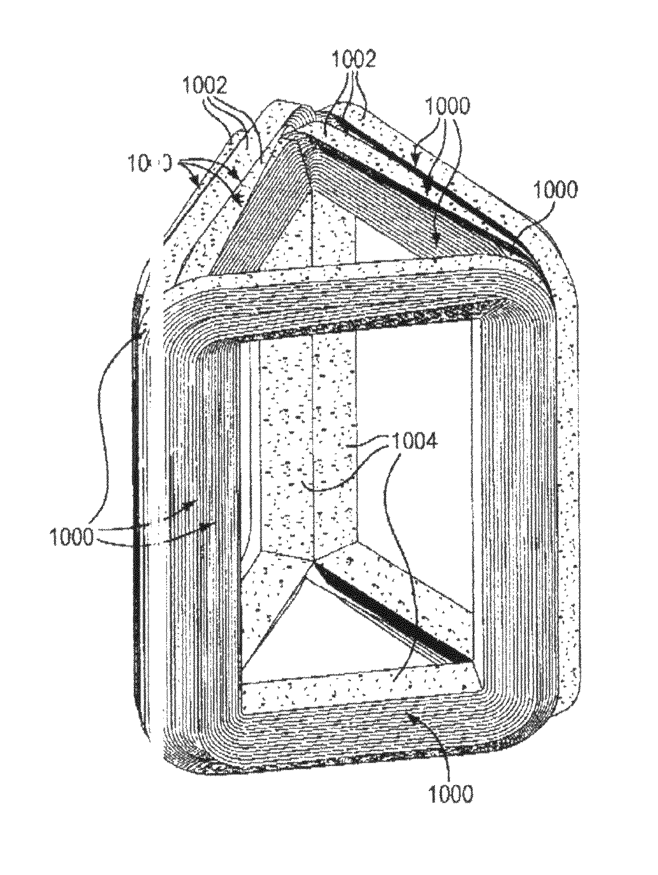 Amorphous metal continuous flux path transformer and method of manufacture