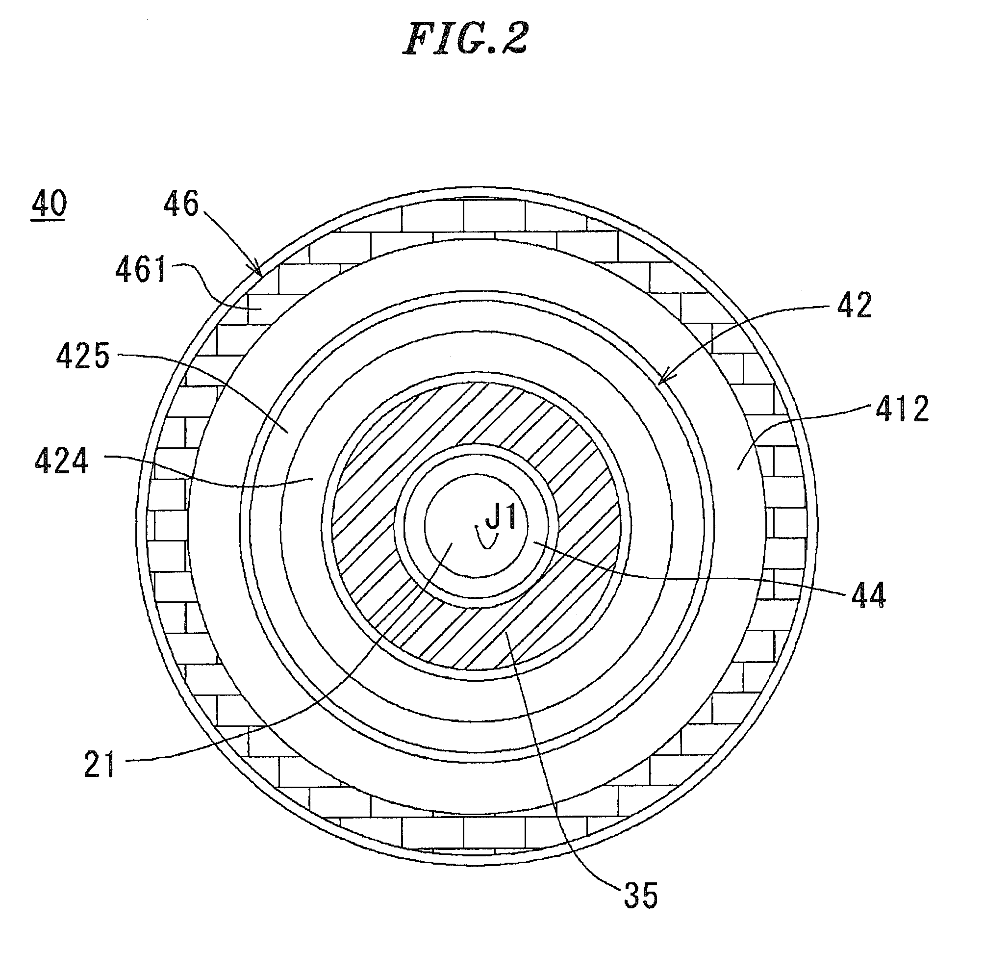 Motor having chucking device and disk driving apparatus including same