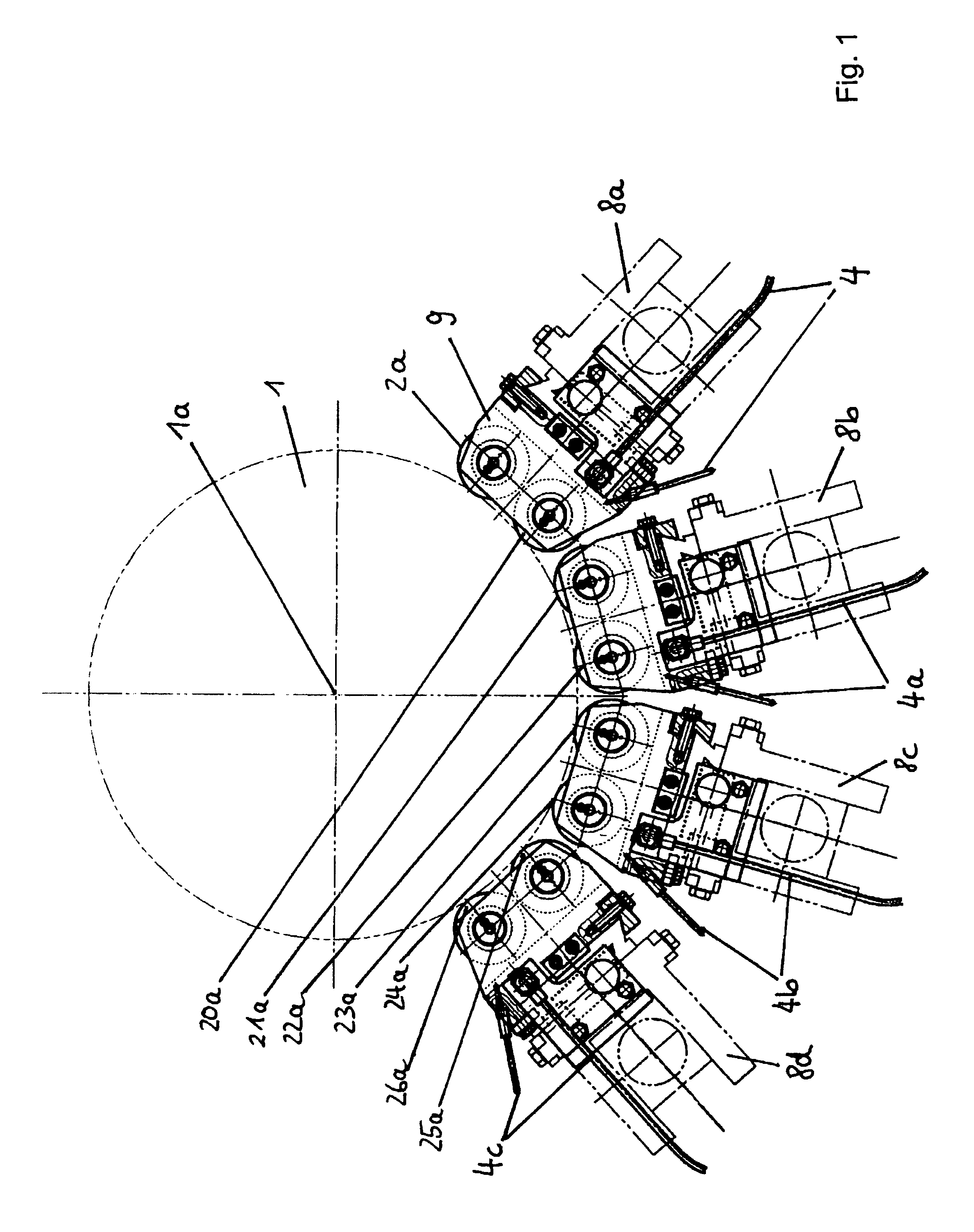 Device for applying at least one surface section of a transfer layer of a transfer film to a web of material and the use thereof