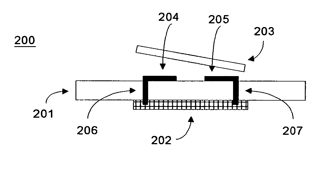 Vacuum packaged micromirror arrays and methods of manufacturing the same