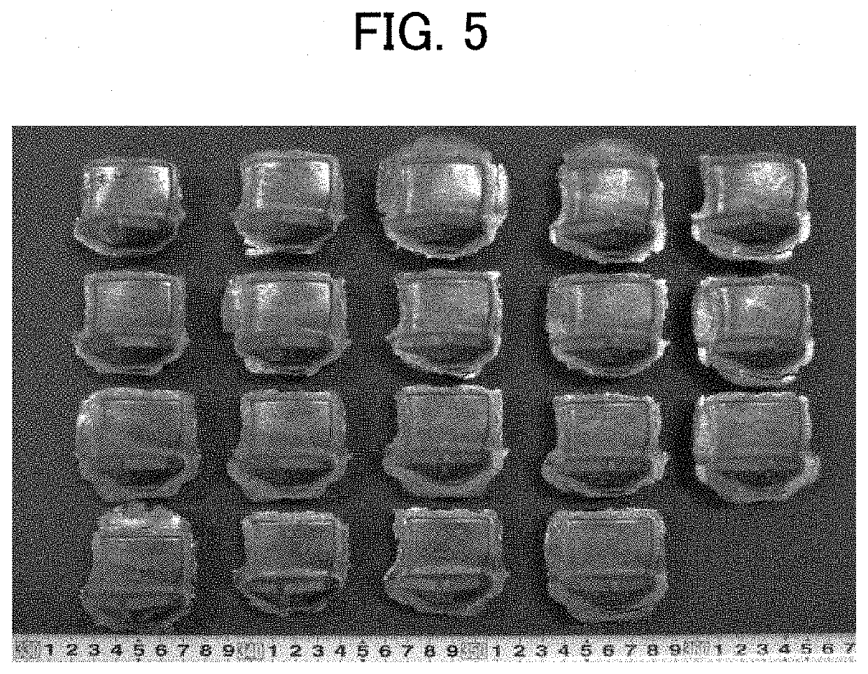 Titanium aluminide alloy material for hot forging and forging method for titanium aluminide alloy material