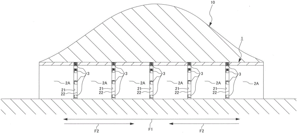 Tunnel axial damping and energy absorbing device and tunnel lining structure with same