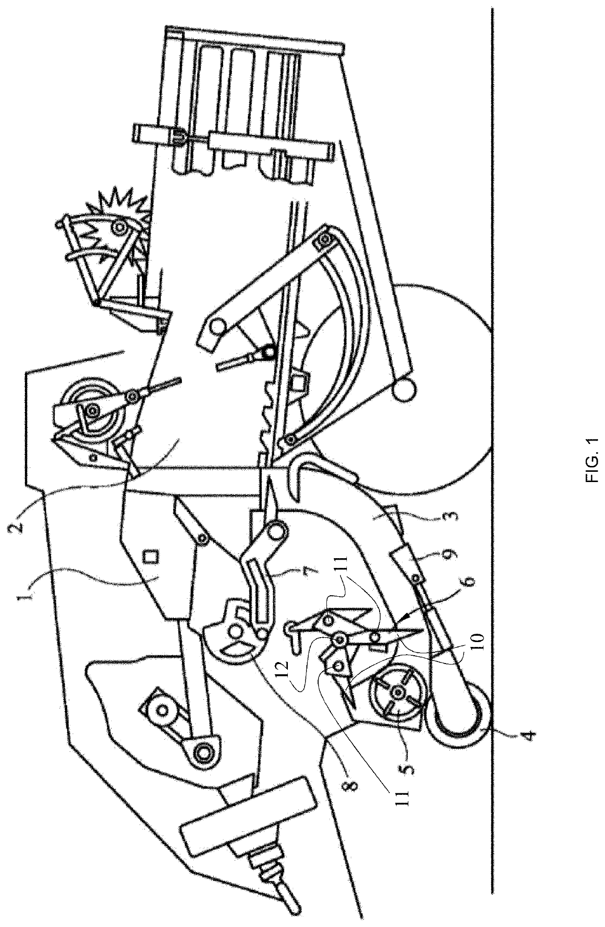 Crank-operated packer mechanism for an agricultural baler