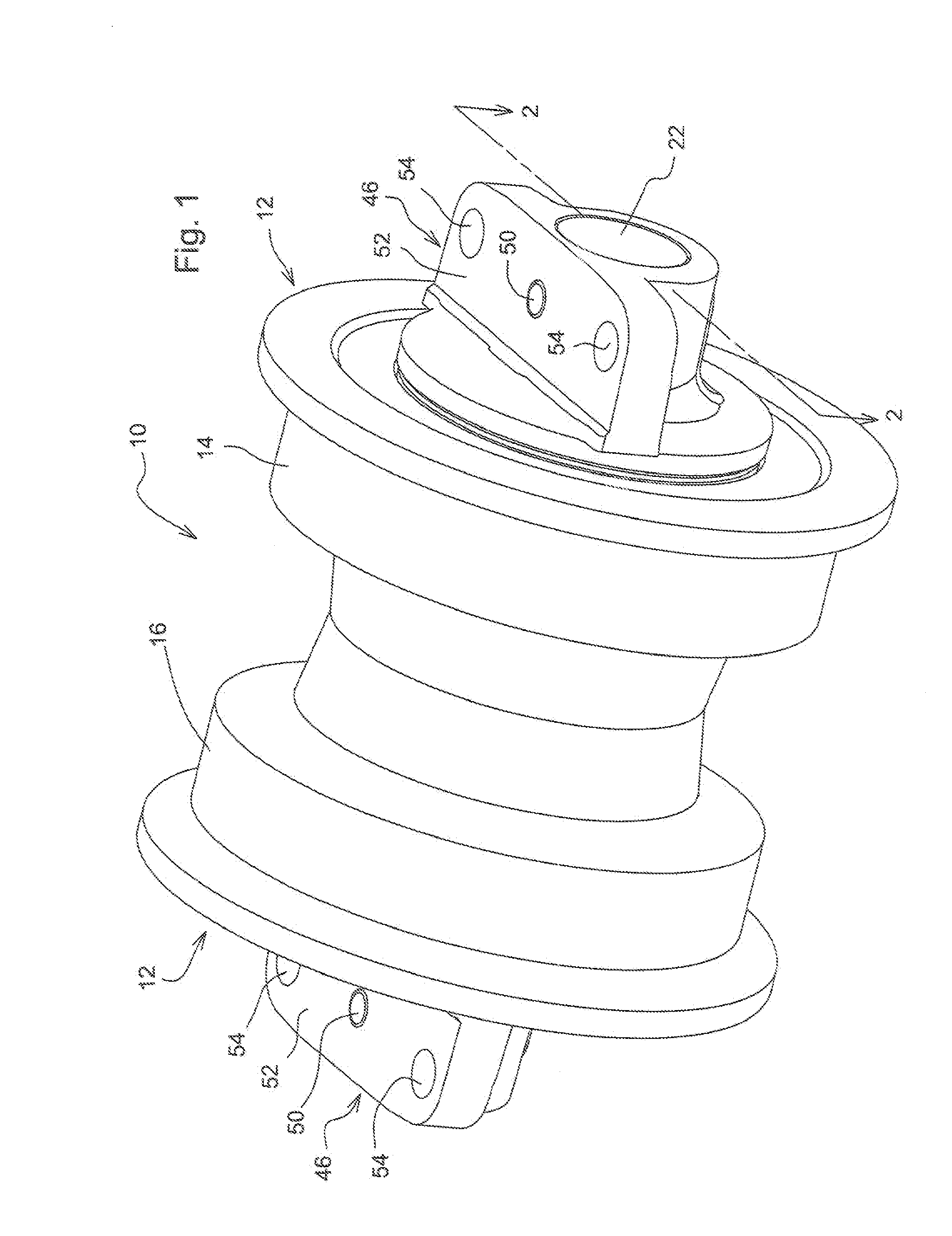 Crawler track roller with internal spherical spacers