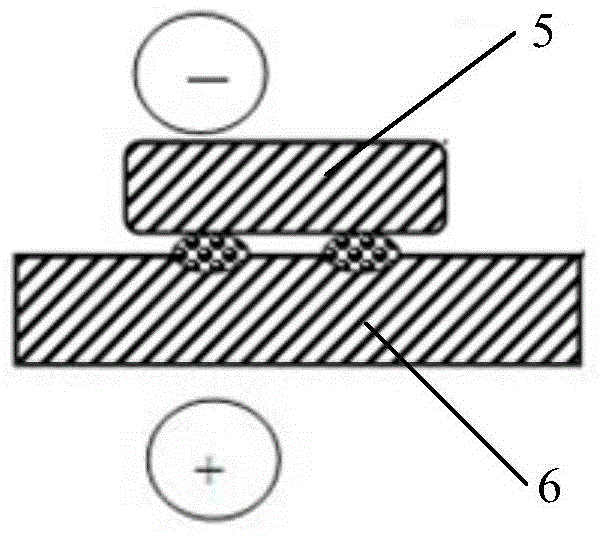 Spot or projection welding method using potential difference between positive and negative electrodes