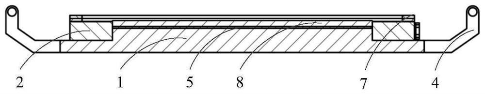 A splicing device for CNC machining of square optical elements