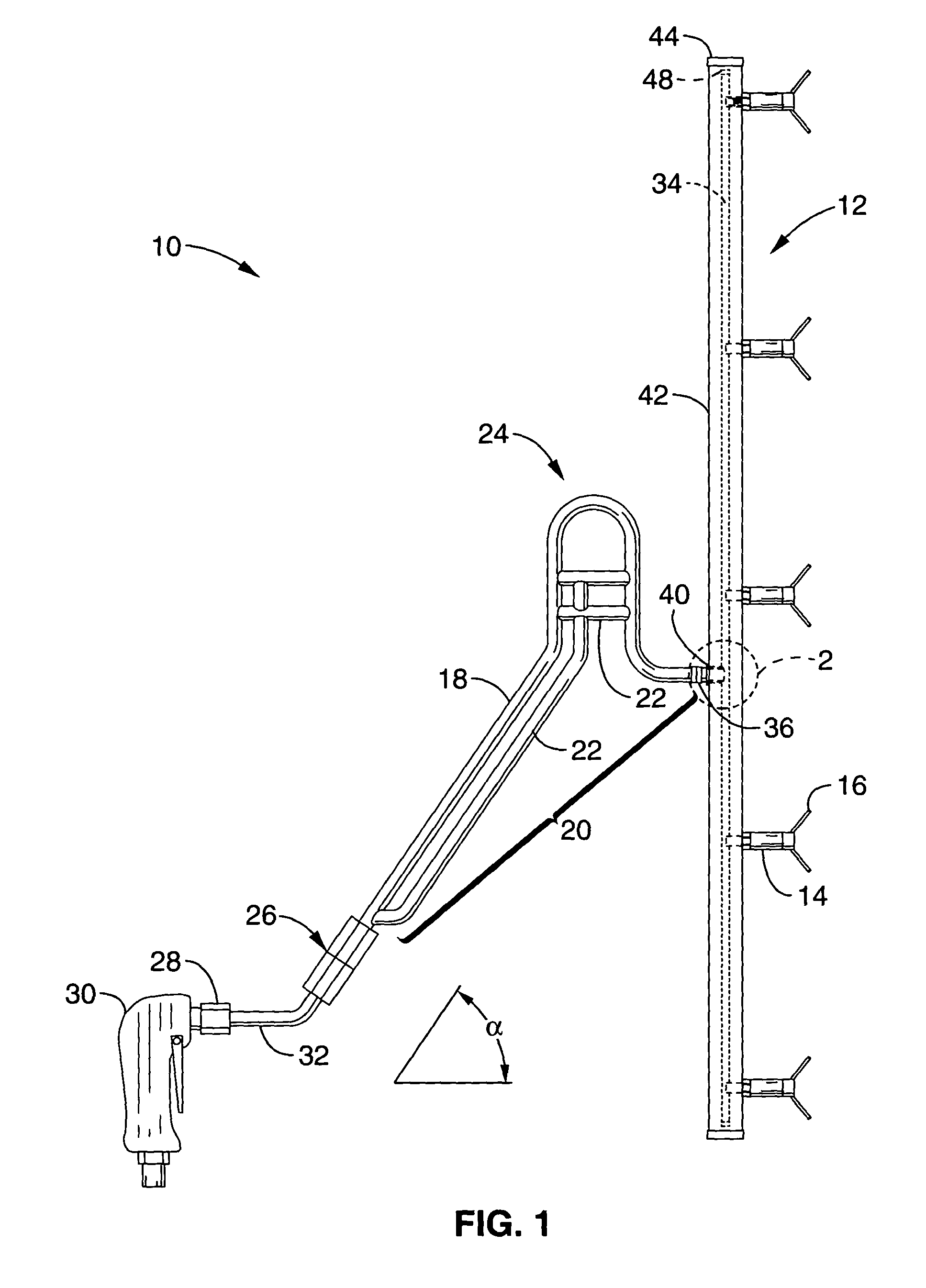 Handheld paint spraying apparatus with anti-sputter spray nozzle