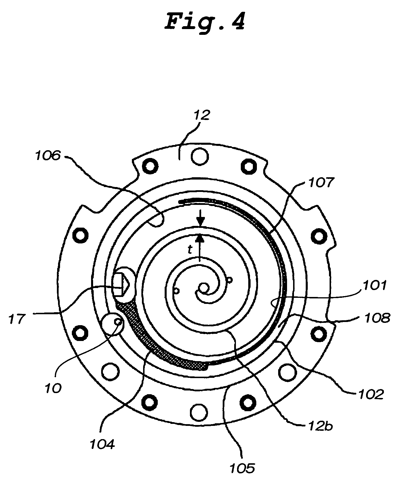 Scroll compressor having an annular recess located outside an annular seal portion and another recess communicating with suction port of fixed scroll
