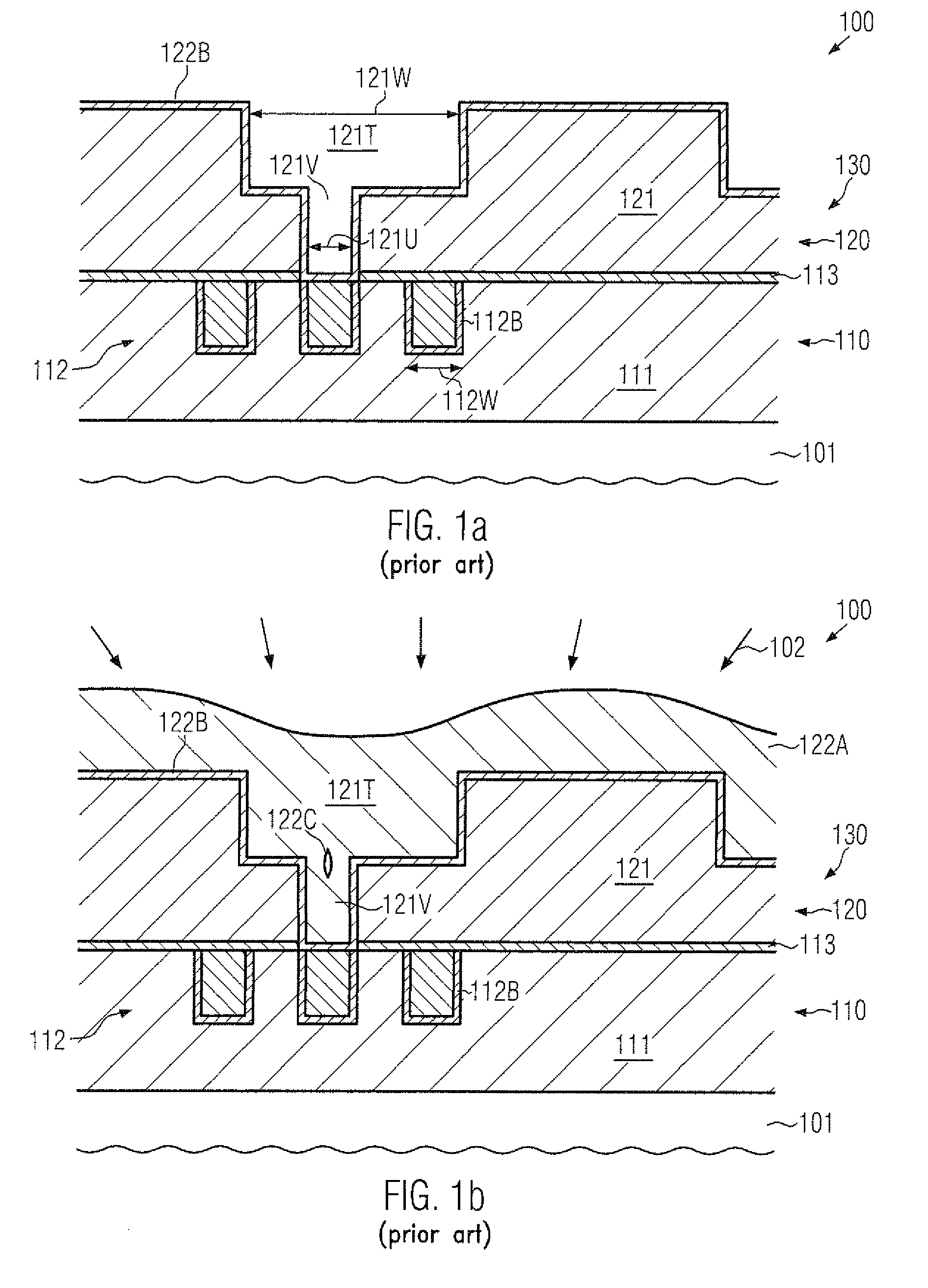 Metallization system of a semiconductor device comprising extra-tapered transition vias
