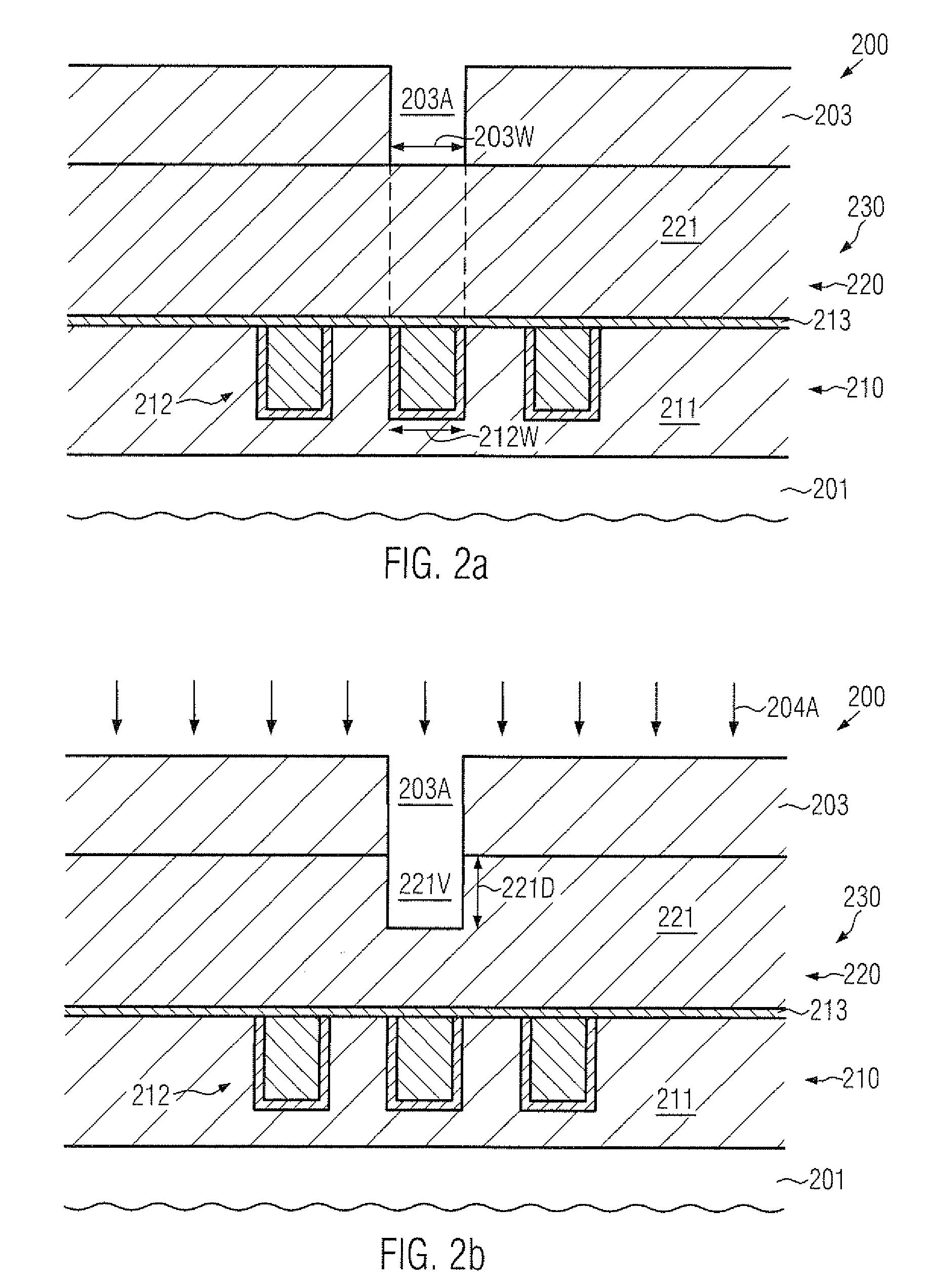 Metallization system of a semiconductor device comprising extra-tapered transition vias