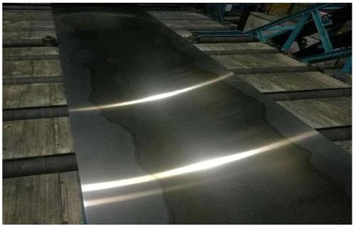 Production method for Al-Zn-Mg-Cu series aluminum alloy panel for safety shoe box toes