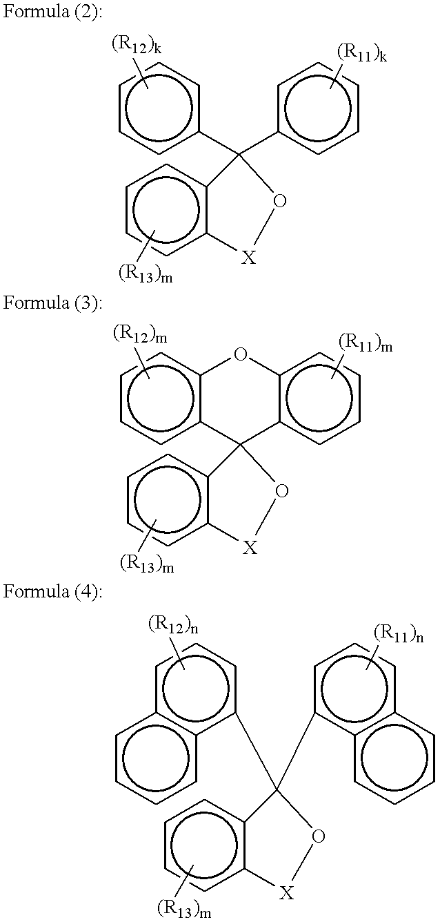 Photosensitive composition containing a dissolution inhibitor and an acid releasing compound