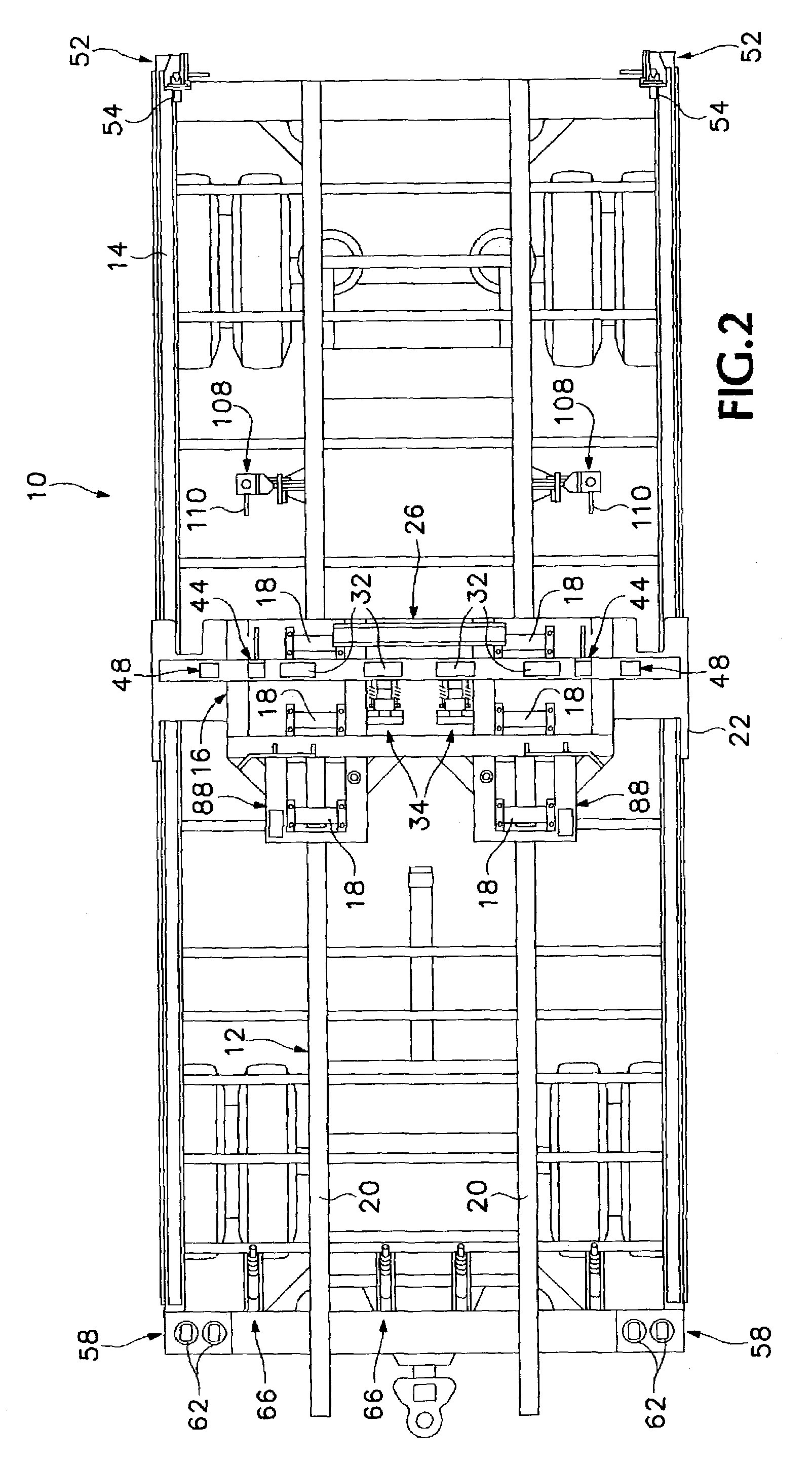 Apparatus for transferring containers and flat racks from a truck to a trailer