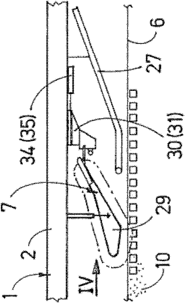 Machine comprising a lifting device for receiving bulk material of a track bed
