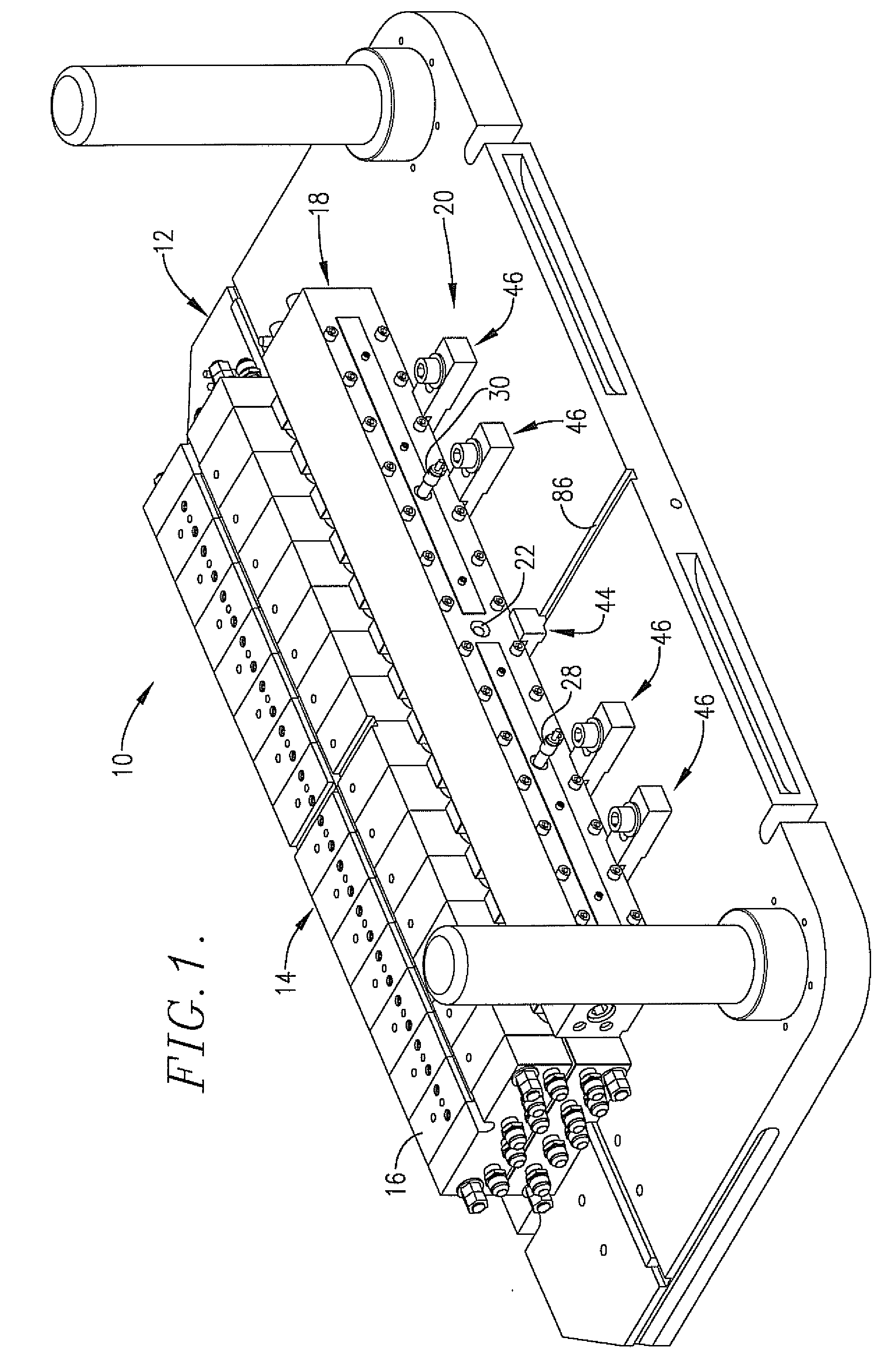 Universal Mounting Brackets for Attaching a Hot Injection Manifold to the Lower Die Set of an Injection Blow Molding Machine