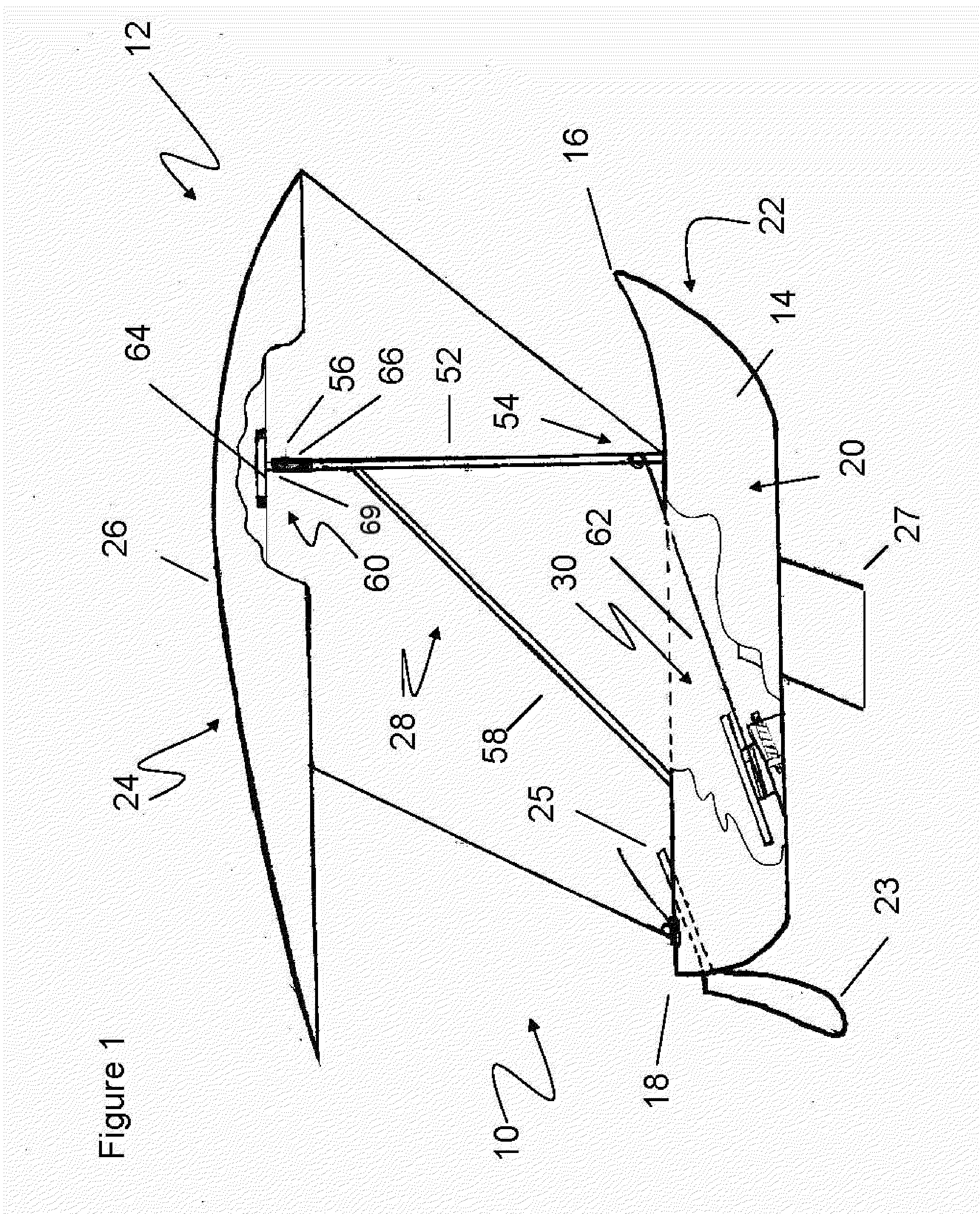 Sailing craft comprising a tilting rigid sail system