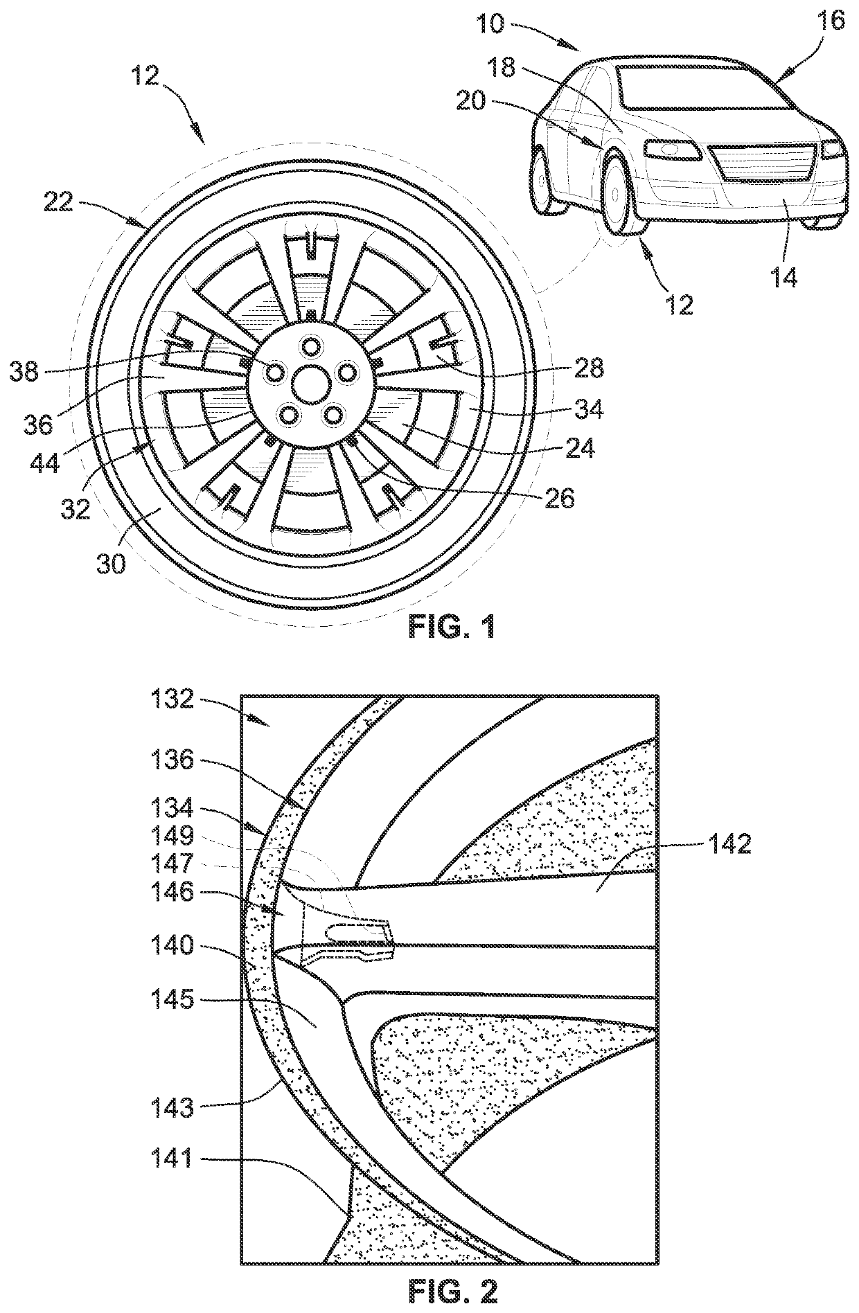 Hybrid metal and composite polymer wheels for motor vehicles