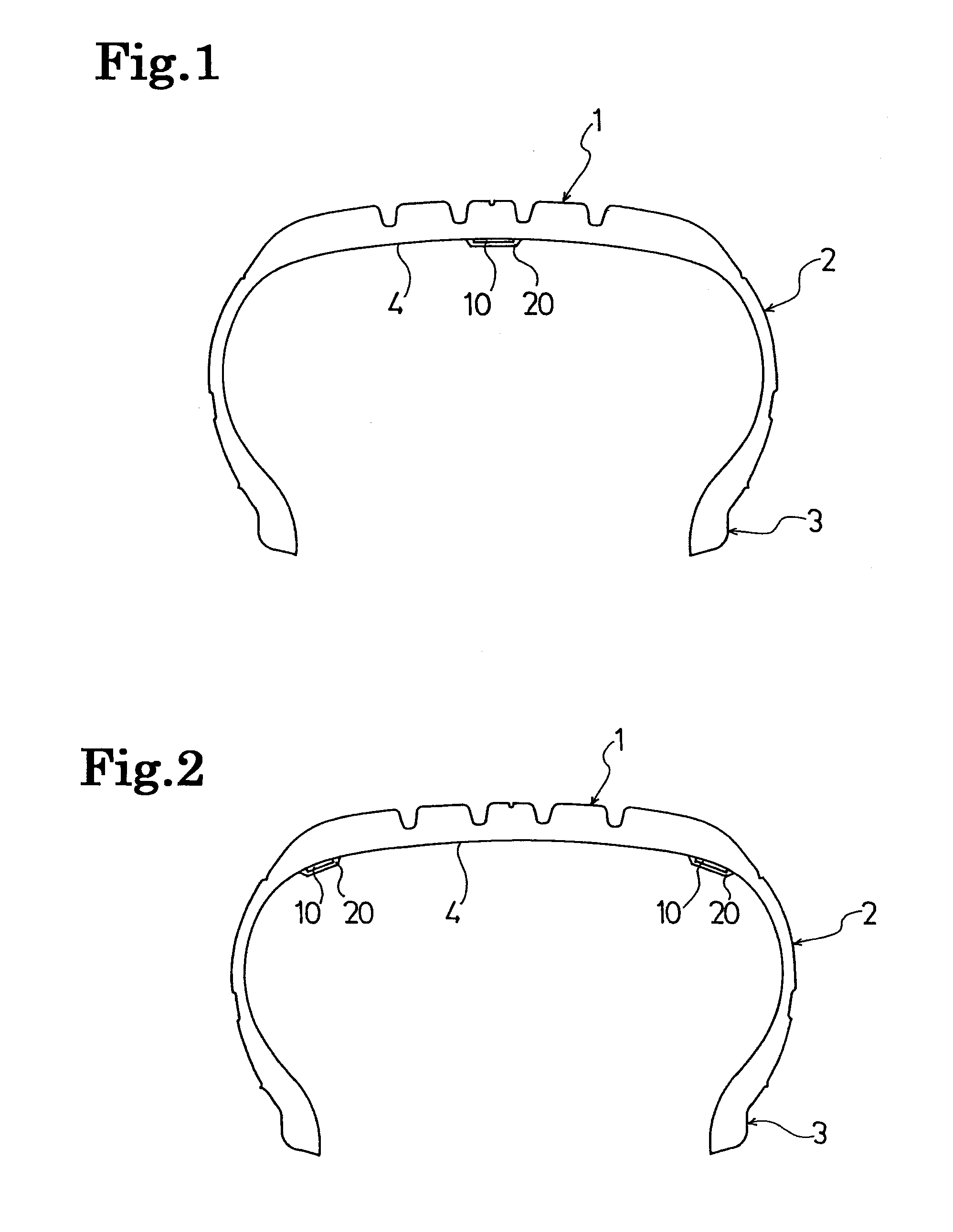 Pneumatic tire with surface fastener and method of producing the same
