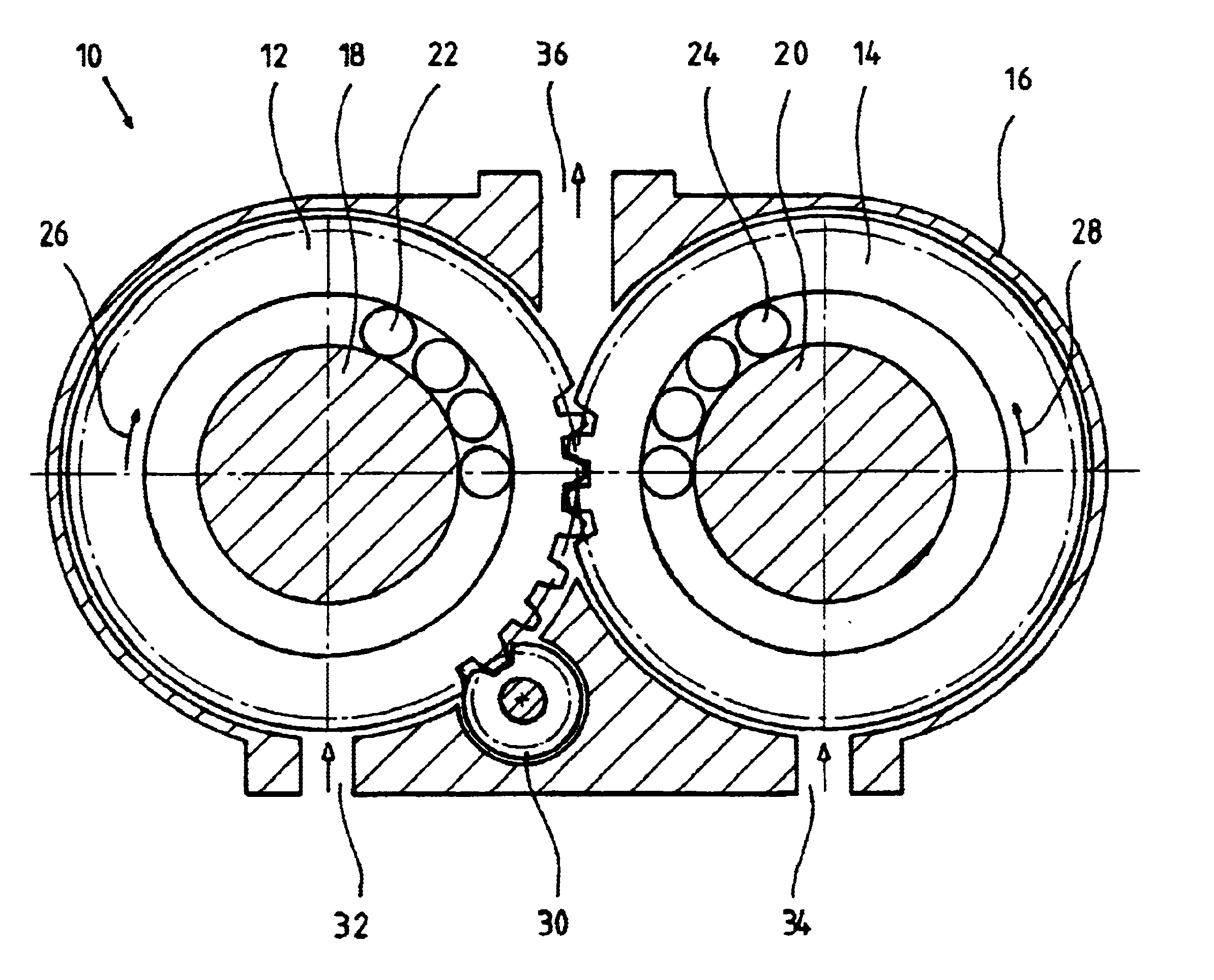 Rotary displacement machine having at least two annular displacement gears and supply channels