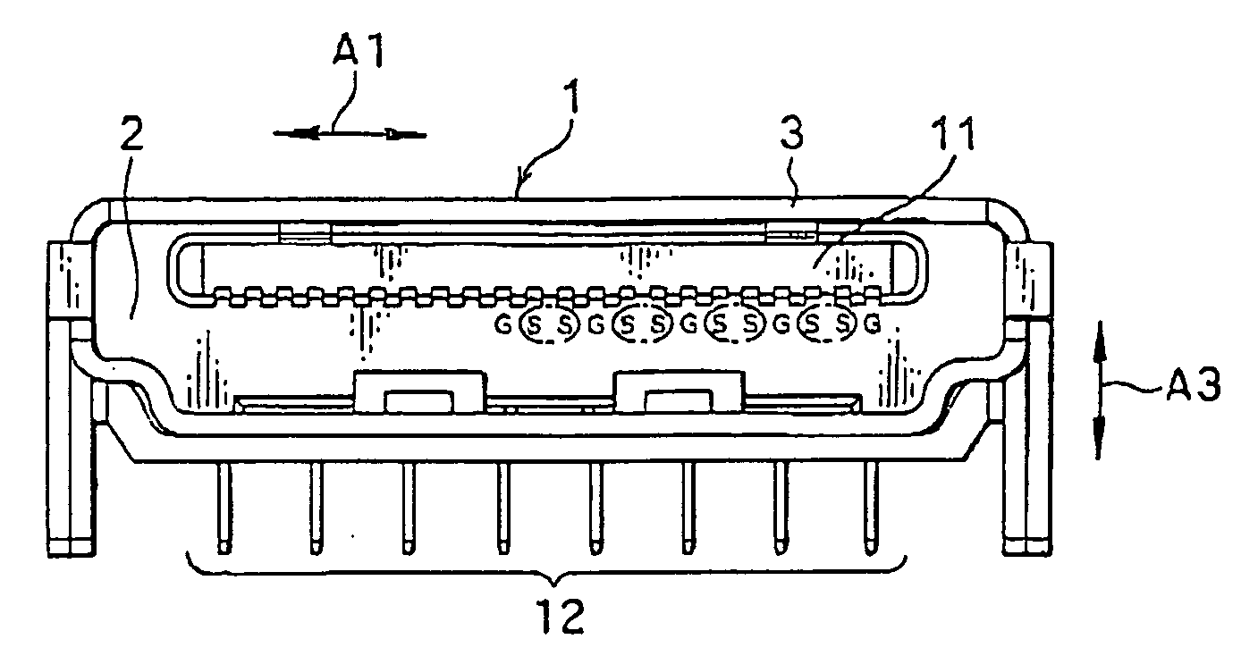 Connector in which a balance in physical distance between a ground contact and a pair of signal contacts can be maintained