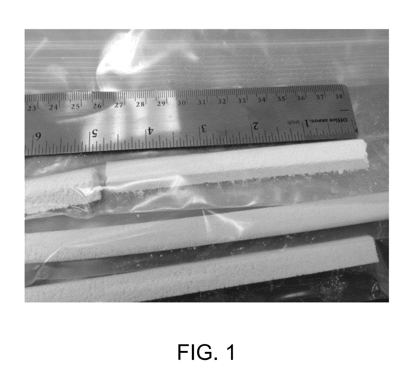 Plga/ha hydroxyapatite composite bone grafts and method of making